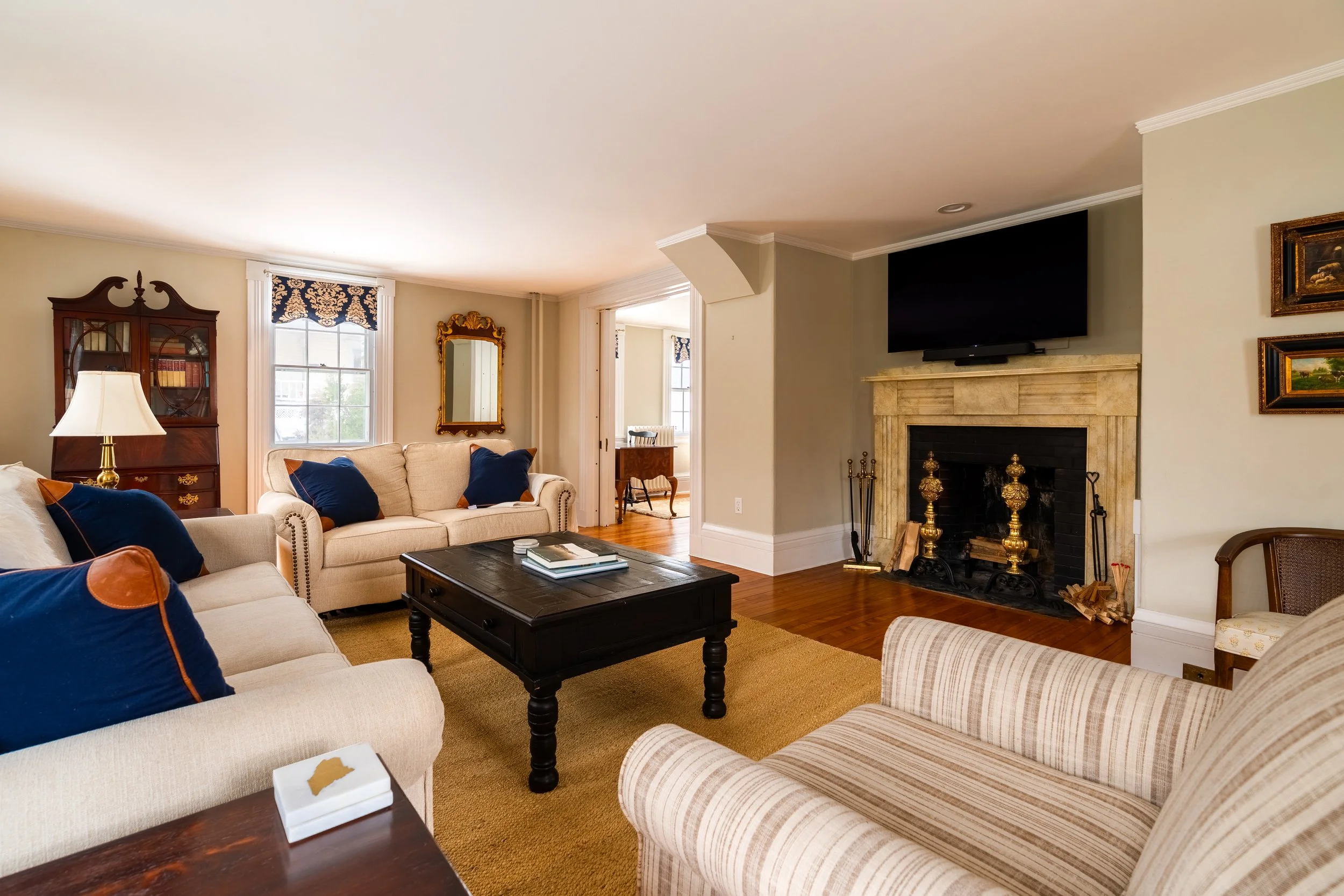 Comfortable living room at Three Sisters House in Camden, Maine.