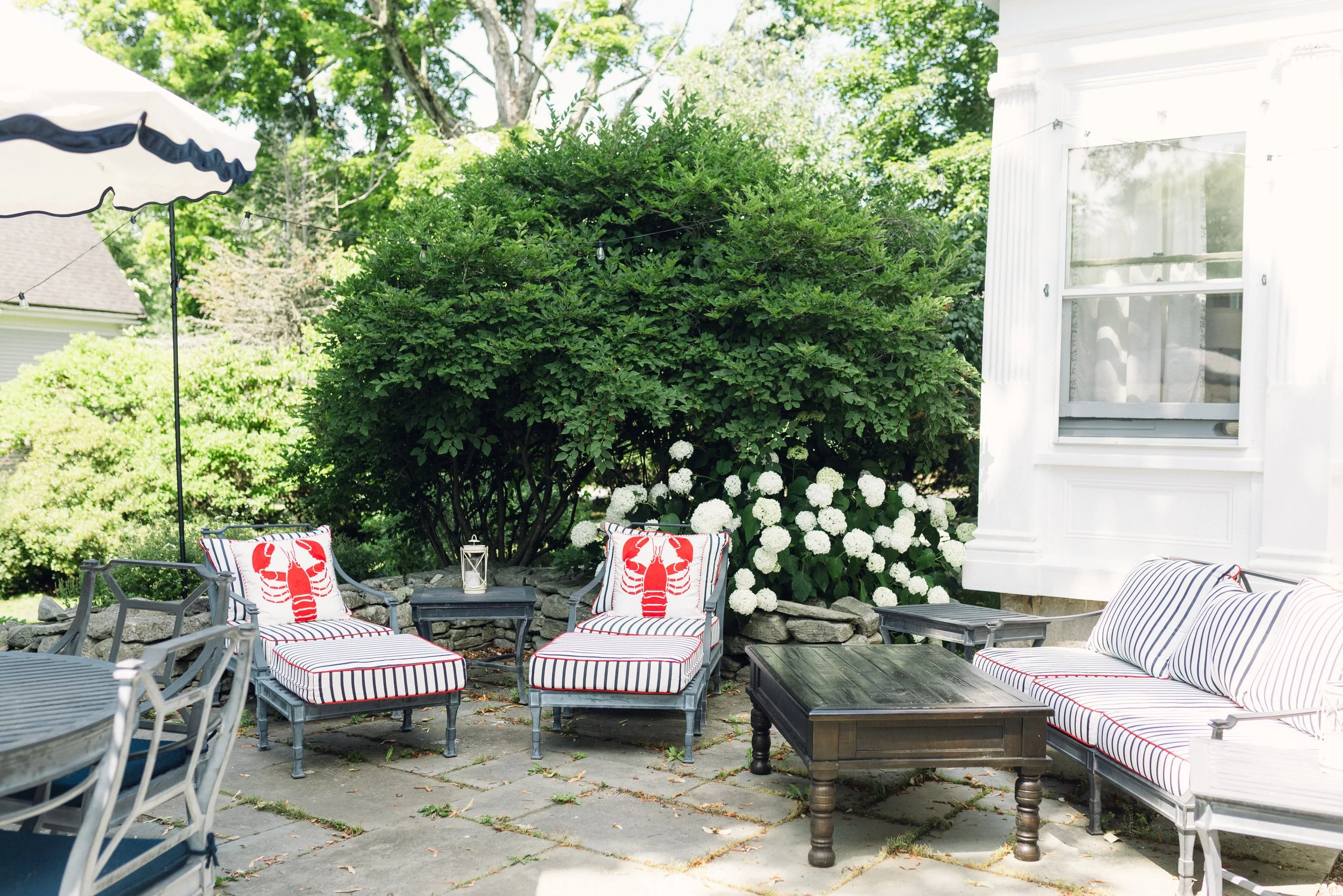 Condé Nast Traveler logo — Three Sisters Farm named one of the best Airbnbs in Maine.