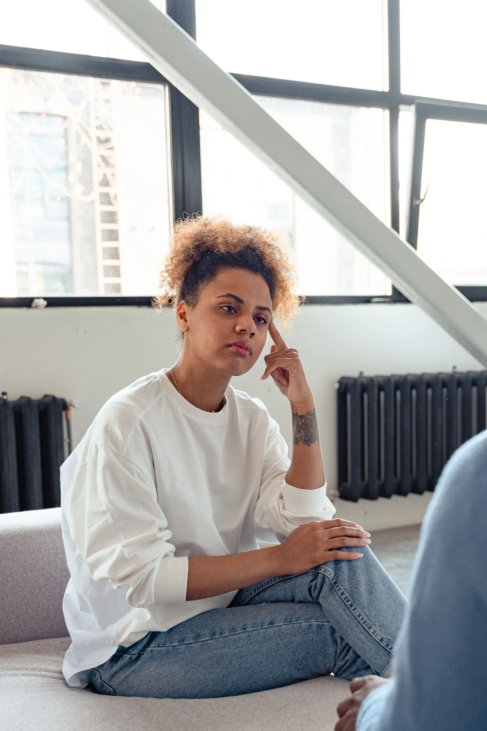 a client speaks to a therapist in albany, ny