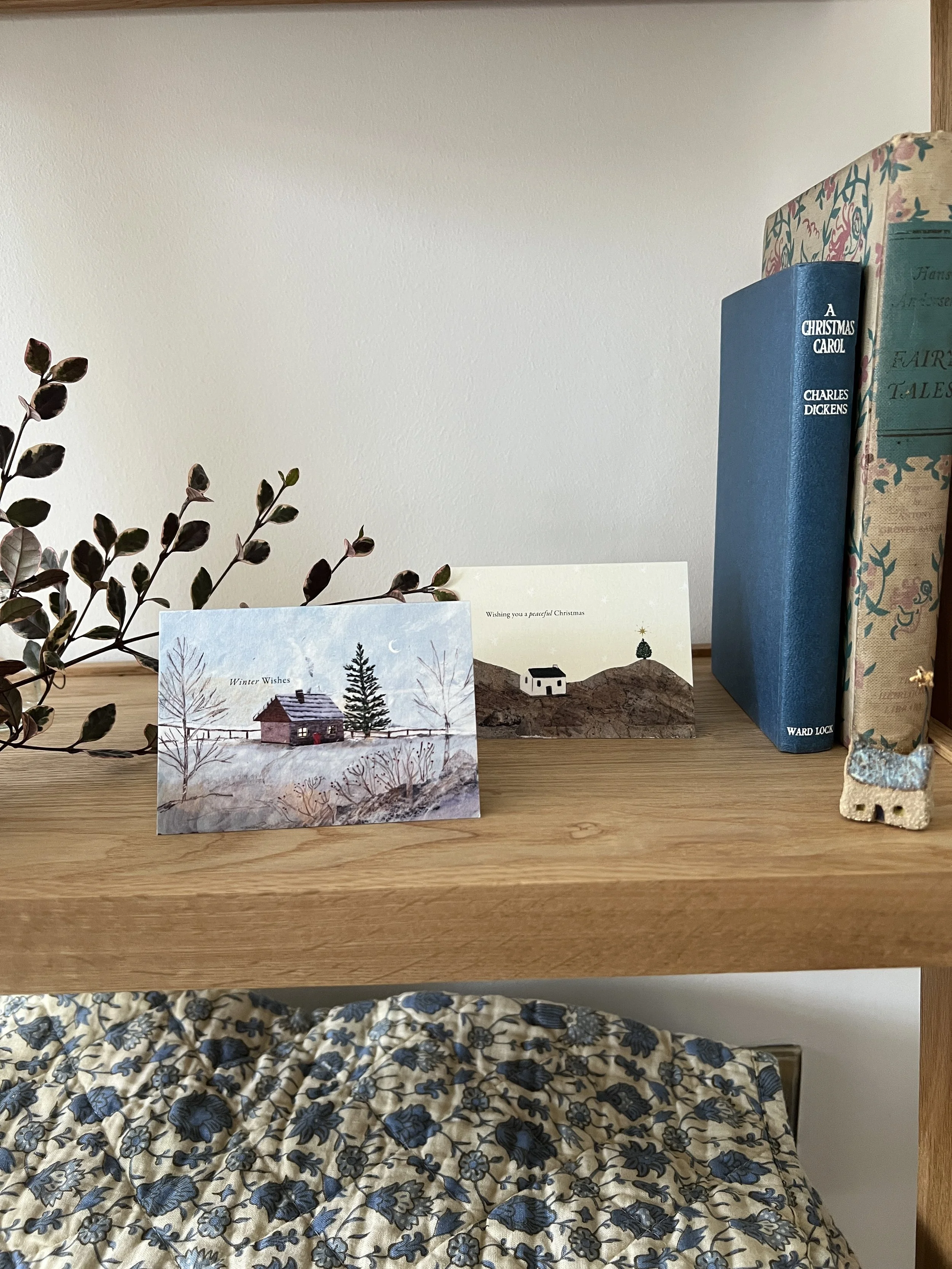 christmas-cards-shelf-books-blanket.JPG