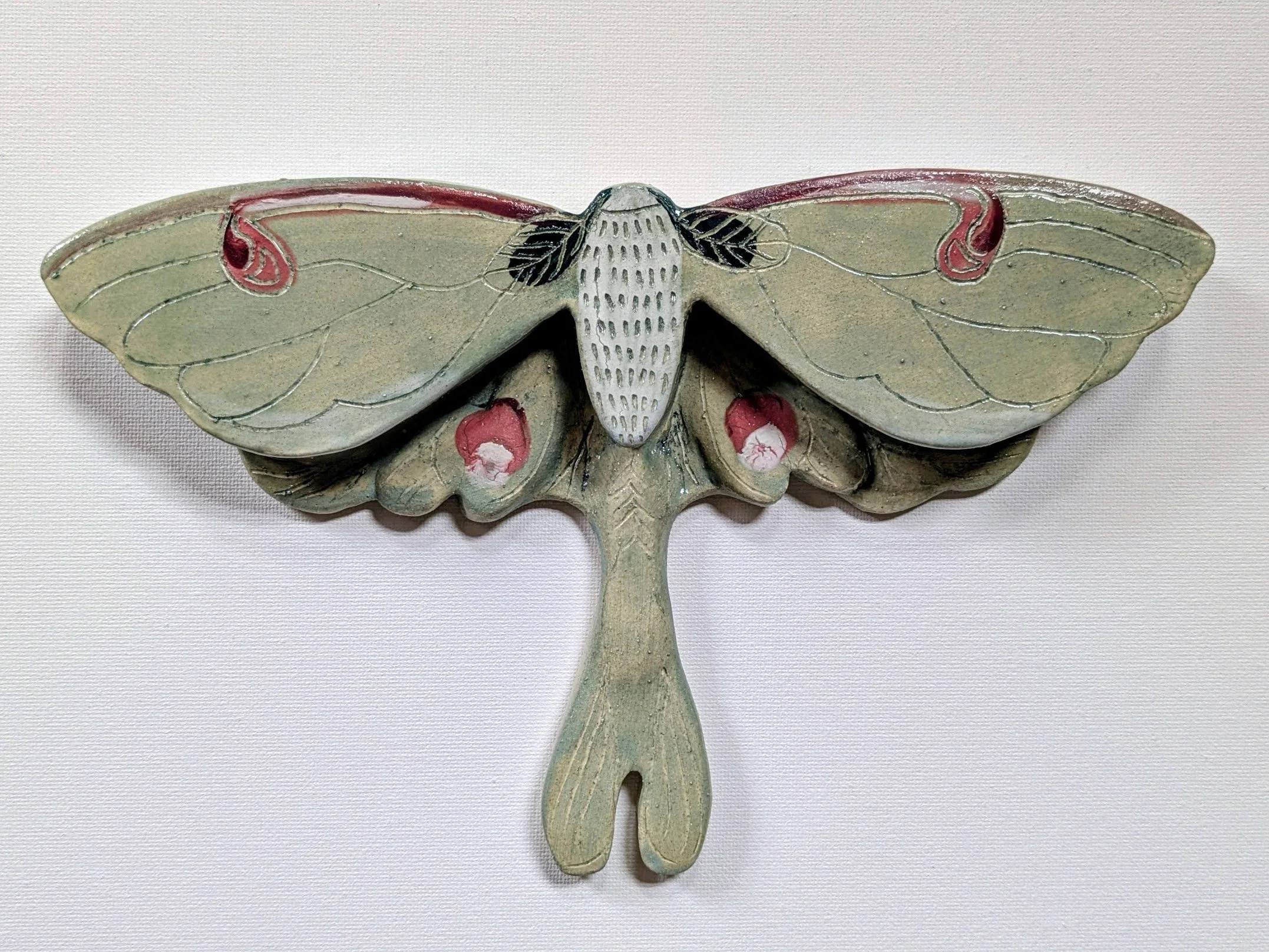 Luna Moth
Ceramic wall sculpture
7"x7"