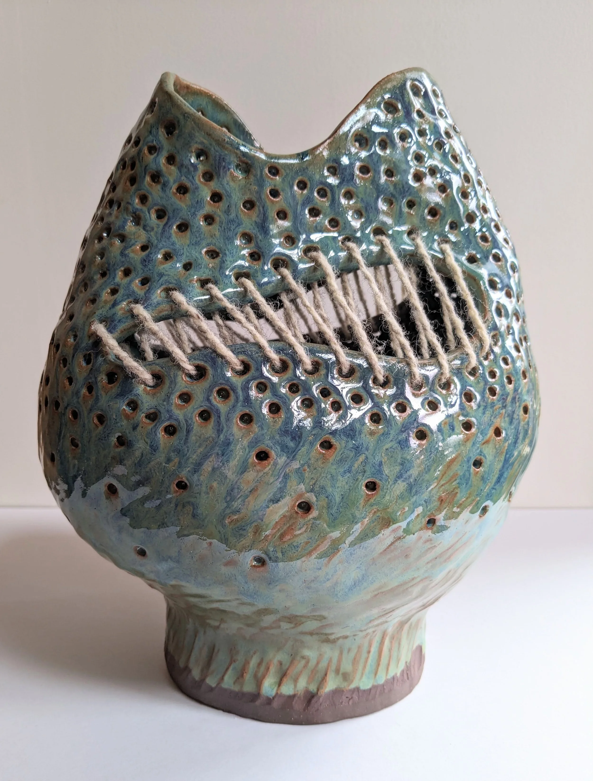 Ceramic Vessel with wool yarn
11"x10"
available at www.artsy.net/kristendonegan