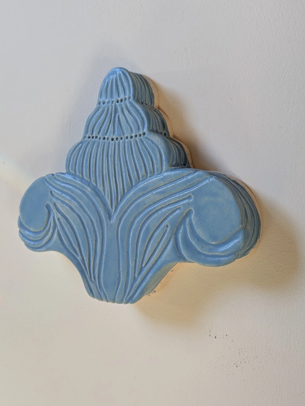 "Finial"
ceramic wall sculpture 8"x6.5"