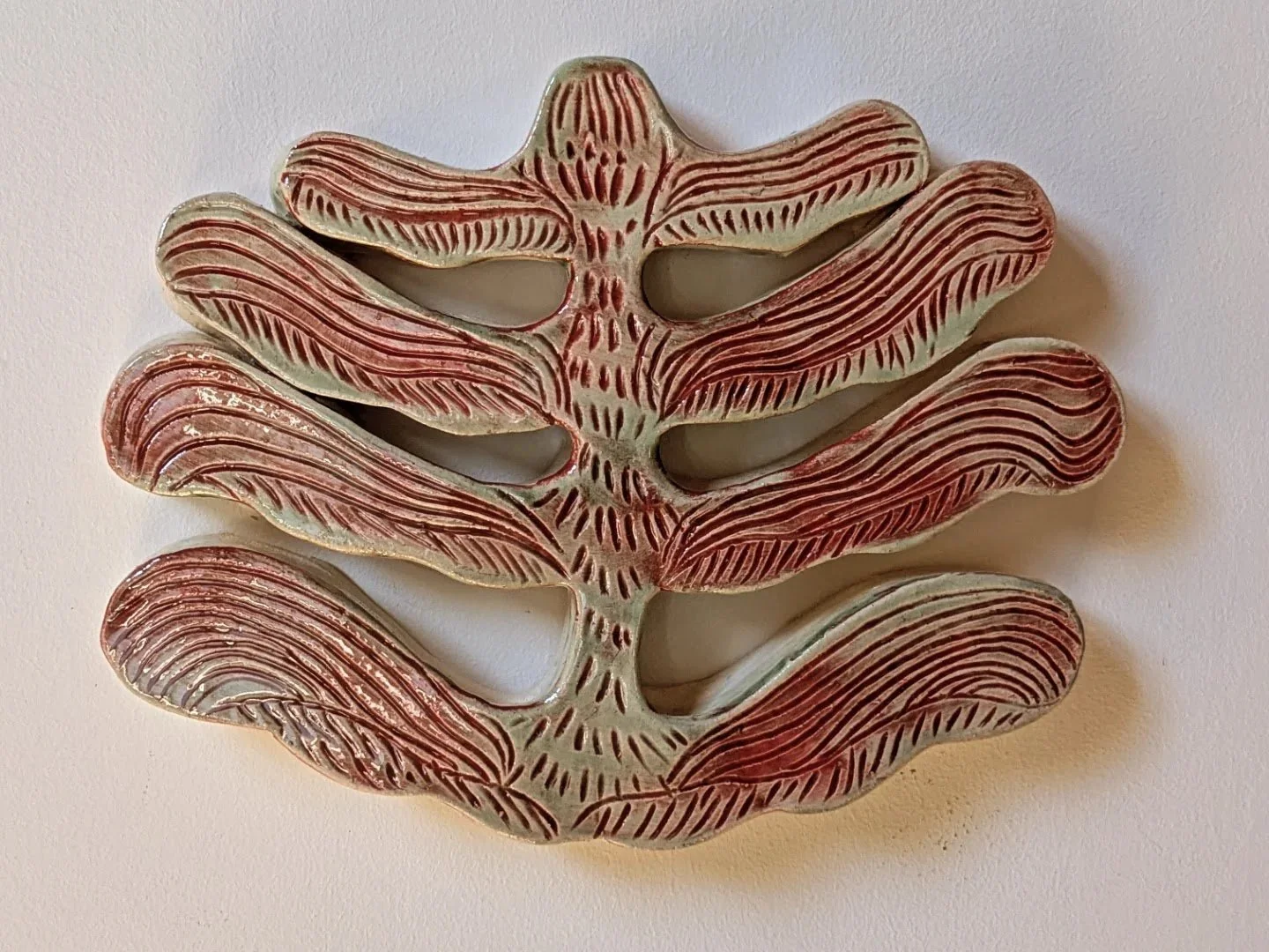 Continuing to Grow
Ceramic Wall Sculpture
9"x7"x1"