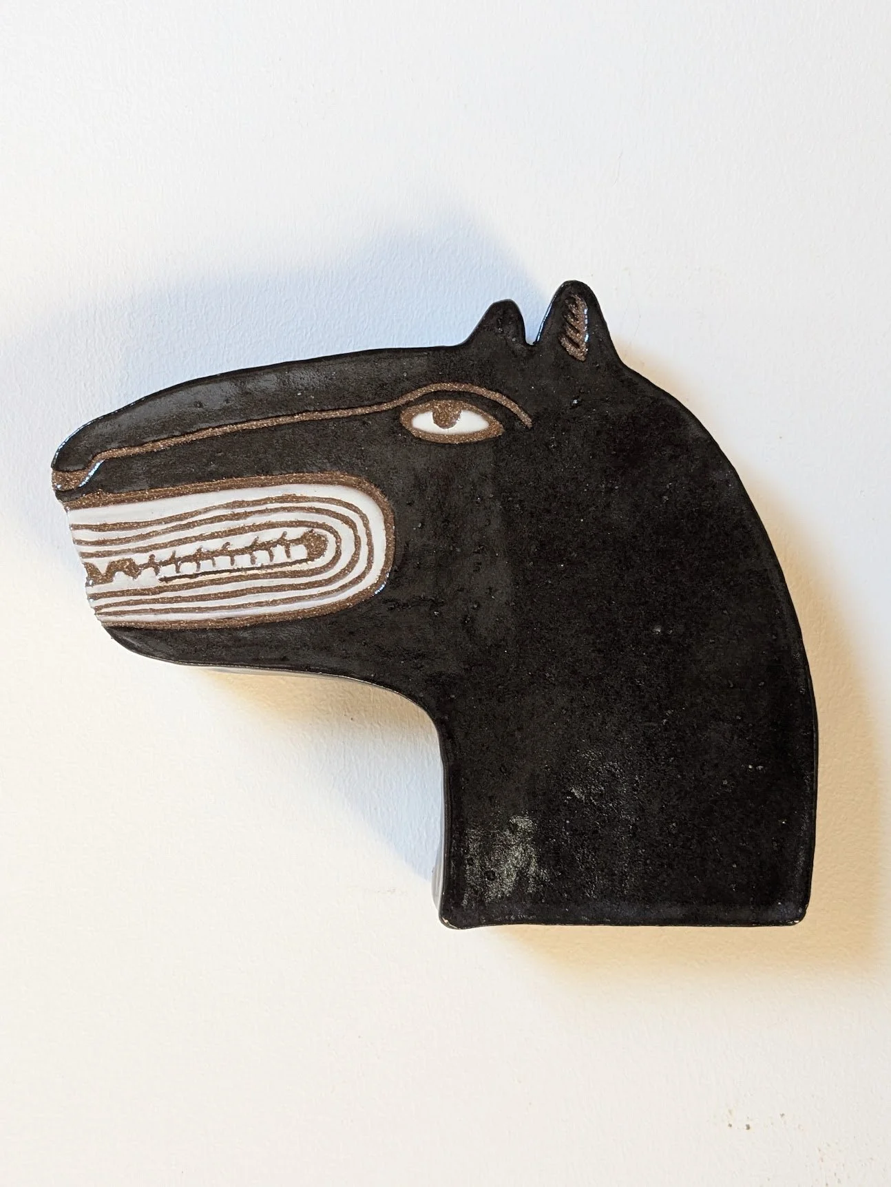 "Desert Creature"
ceramic wall sculpture 6"x5.5" SOLD