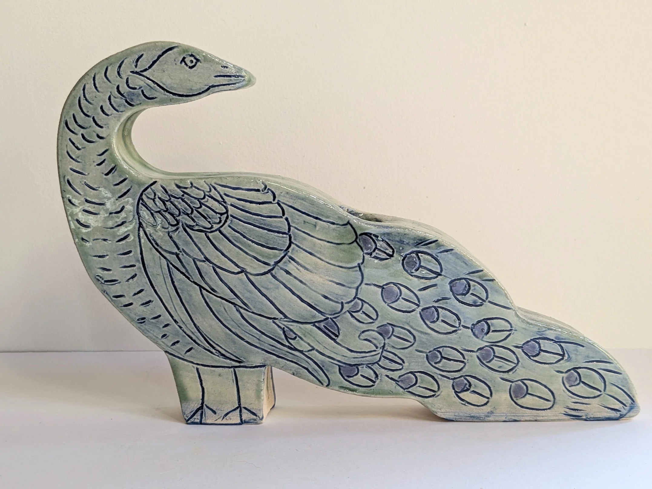 Peacock Candle Holder
Ceramic
11.5"x7"x1.25"