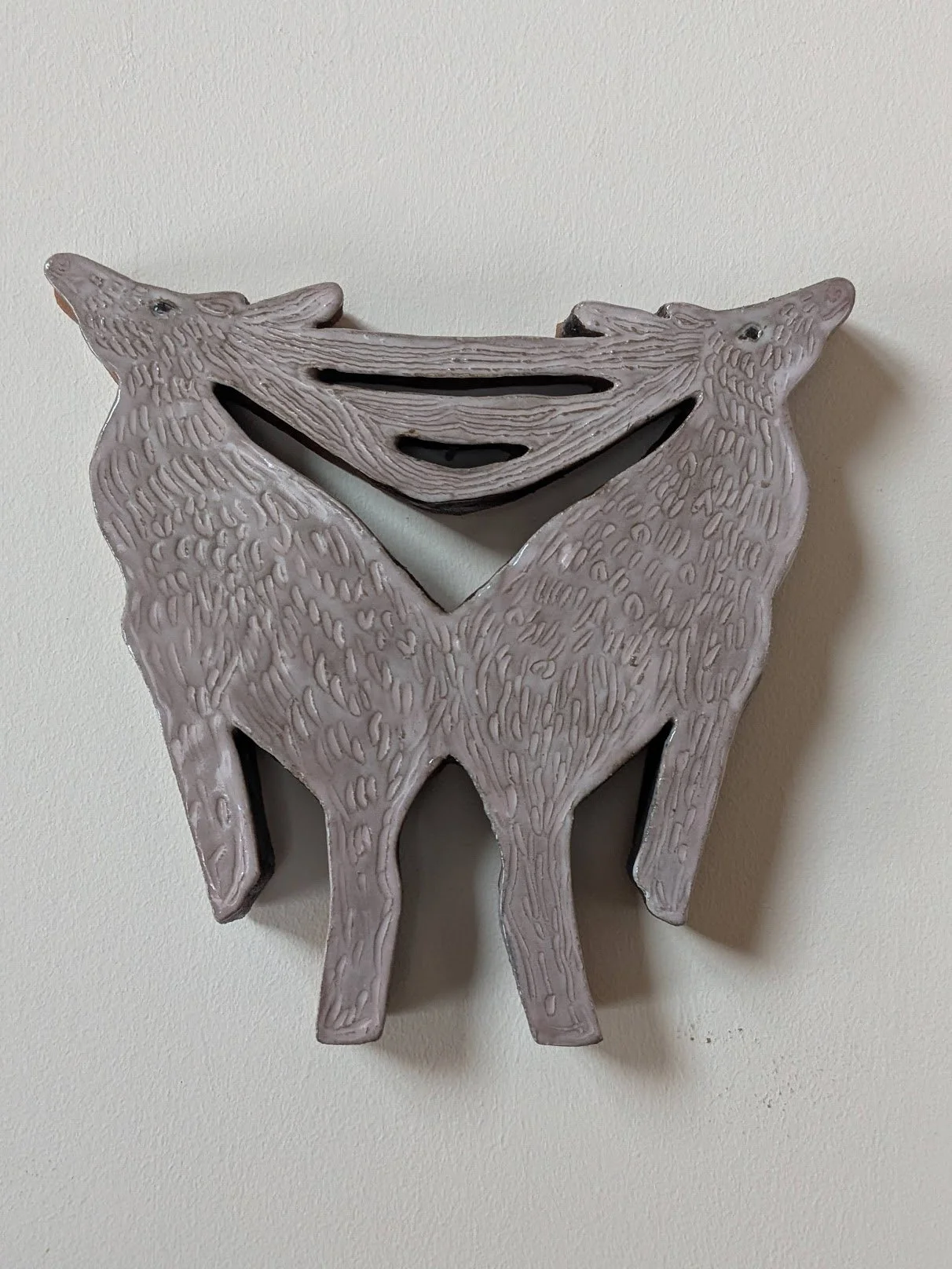 Pulling Apart
ceramic 9"x7"  SOLD