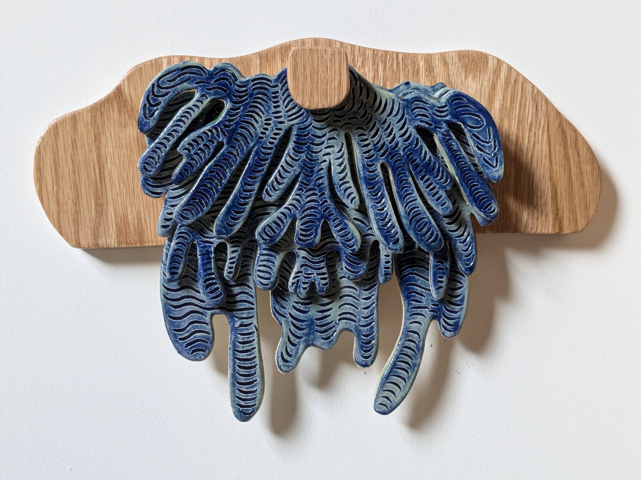 "Ambitions in Nature"
ceramic and wood kinetic wall sculpture