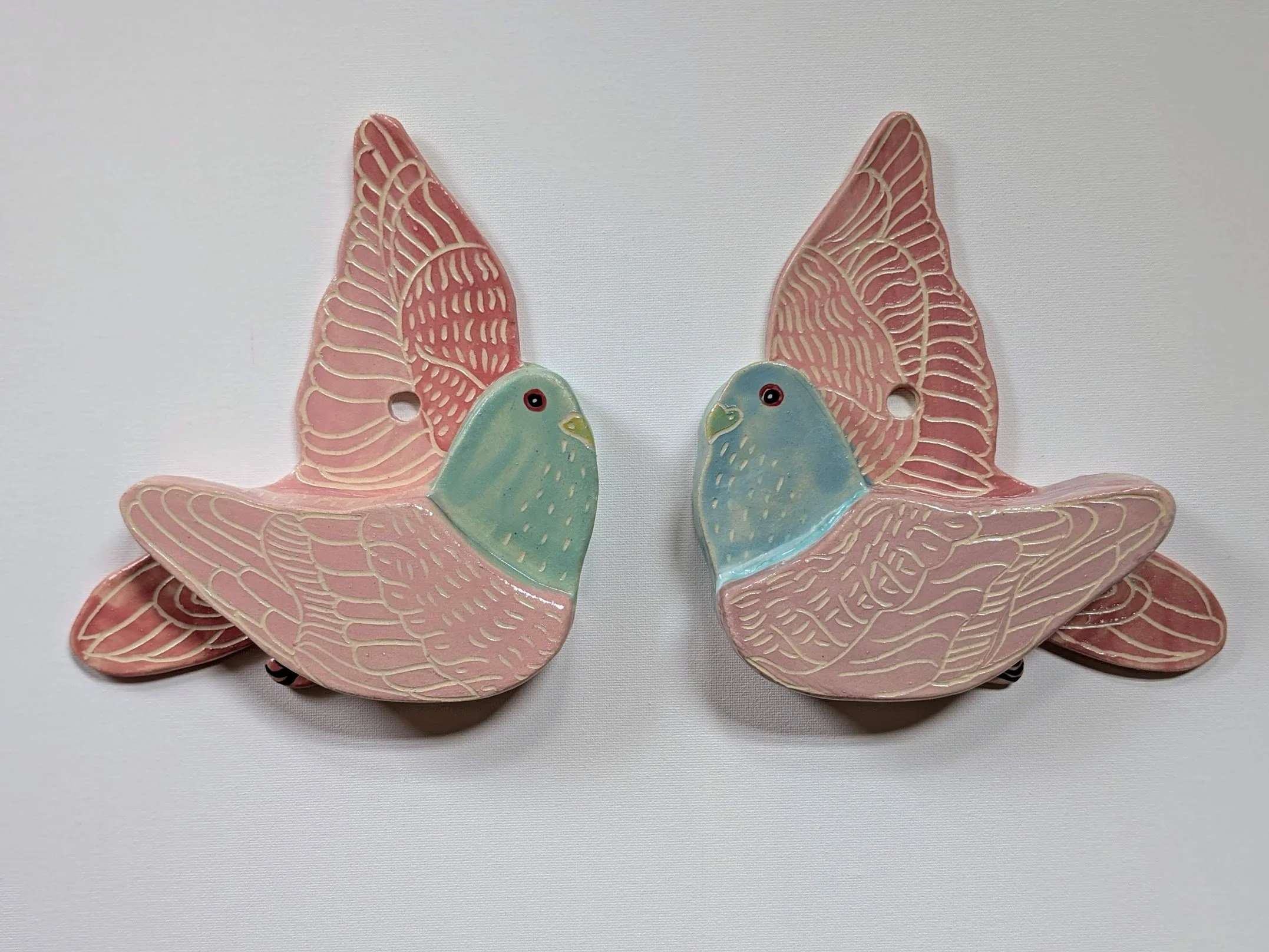The Messengers
Ceramic Wall Sculpture
12"x8" each SOLD