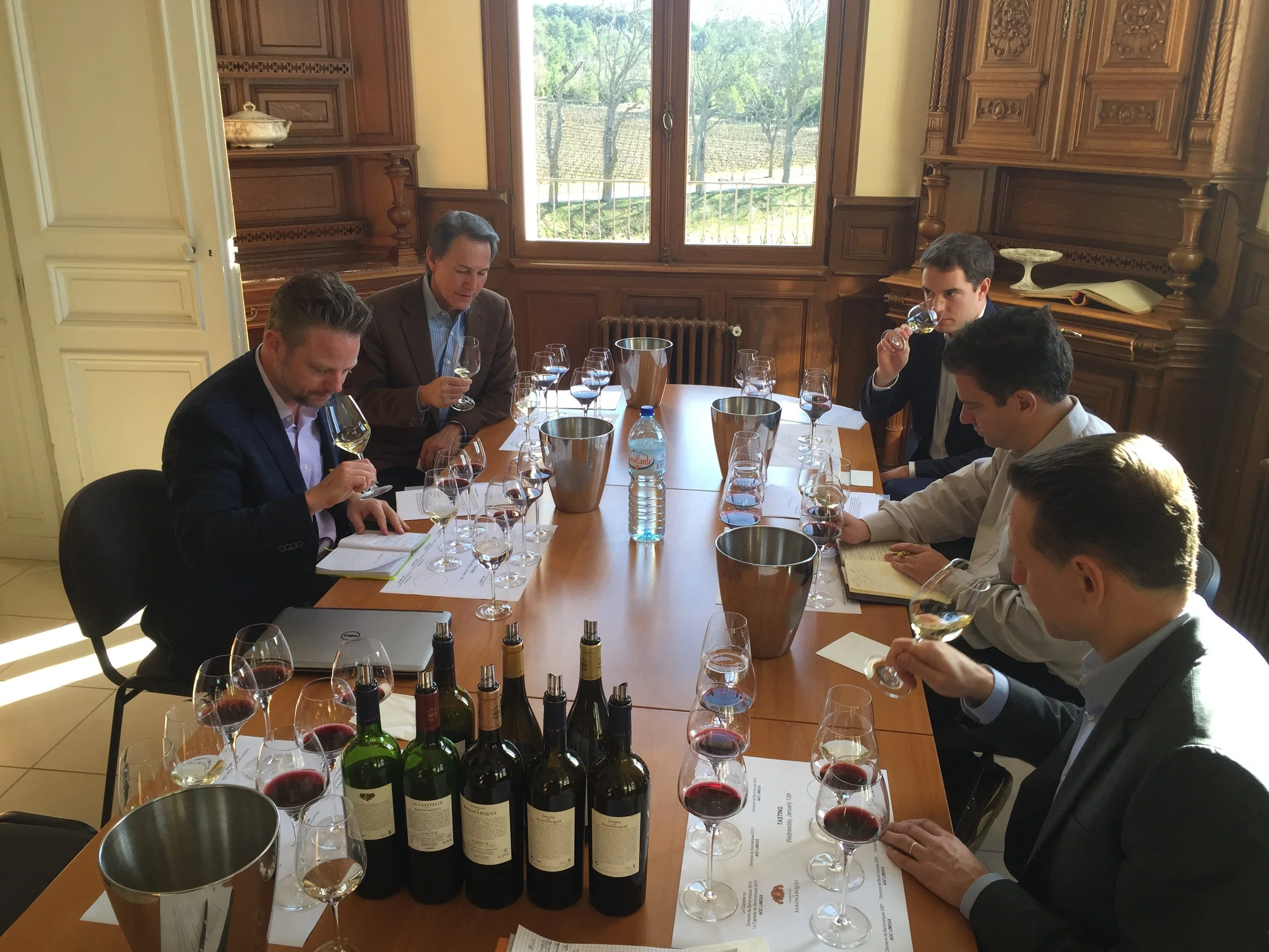 Peter Baedeker tasting through the lineup at the Rothschild's Domain d'Baron Arques in Limoux, France. Working on importation contracts and agreements. 