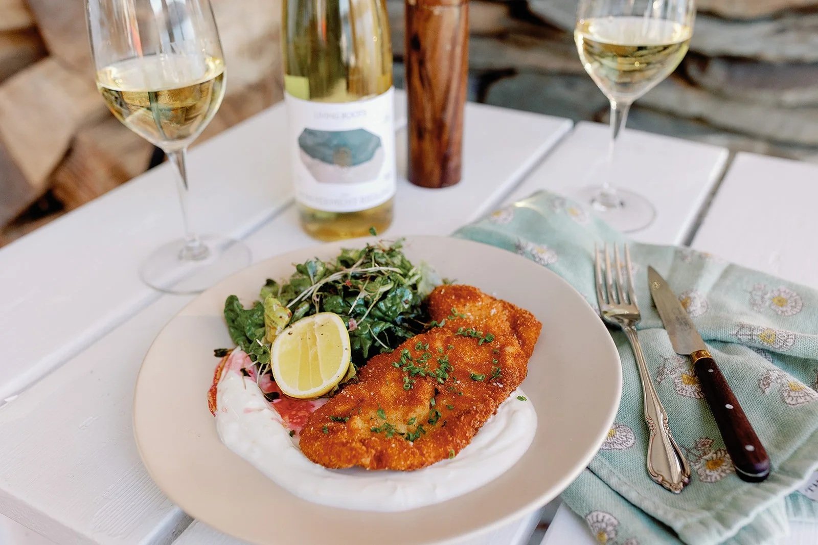 chicken cutlets over whipped lemony yogurt, spring green salad