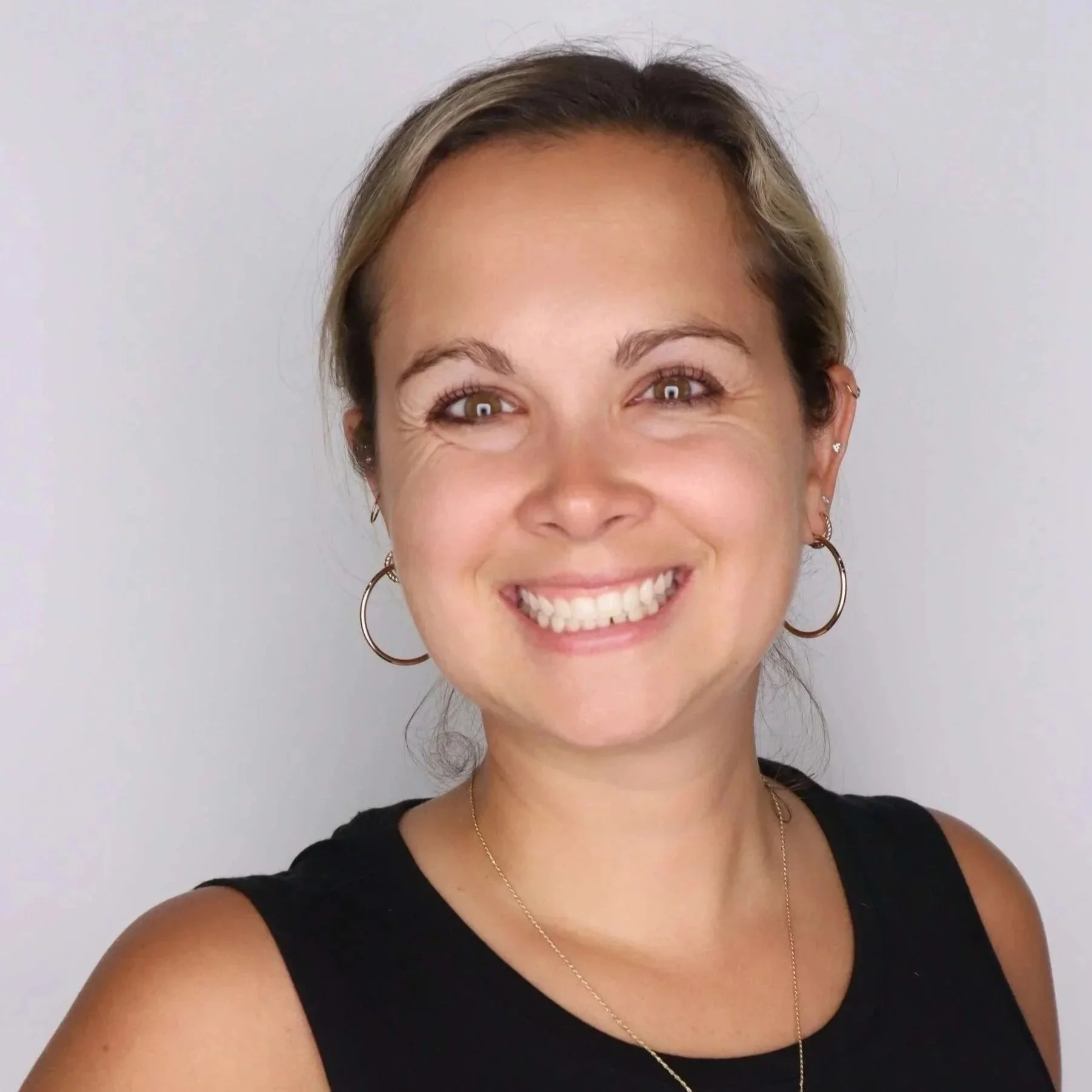 Bio photo of Annie Montero, LAC at Thrively Co. offering compassionate counseling for children, teens, and families