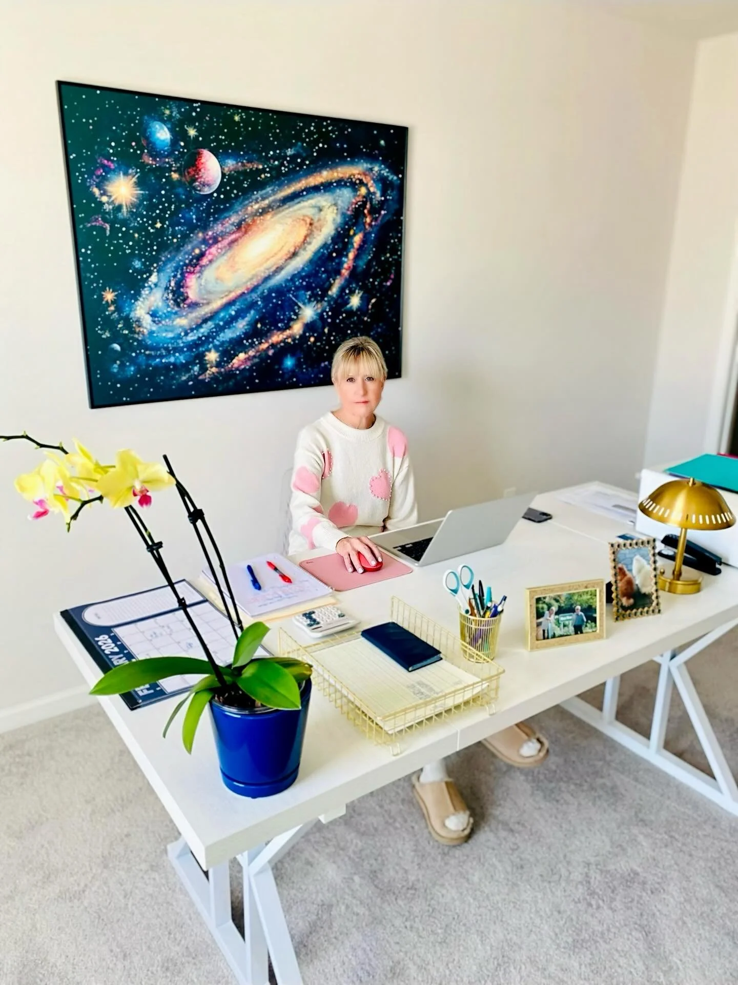 **Happy Monday from Woo Girl HQ!** 🎸

Meet Linda: our secret weapon behind the scenes at Woo Girl PR.

Don&rsquo;t let the cozy sweater and orchids fool you: this woman has run bookstores, managed retail empires, and once owned the legendary Li-Lac 