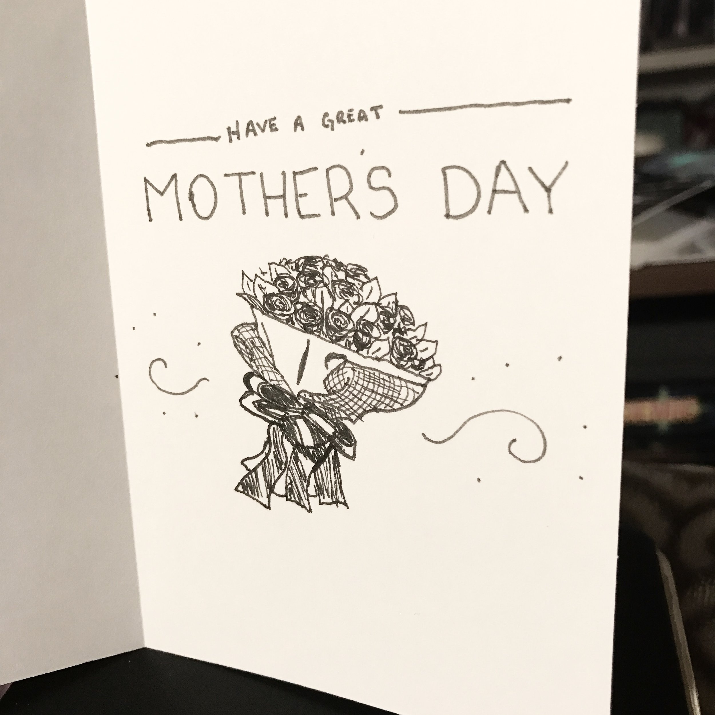 A ribbon wrapped bouquet of roses with the caption Have a Great Mothers Day