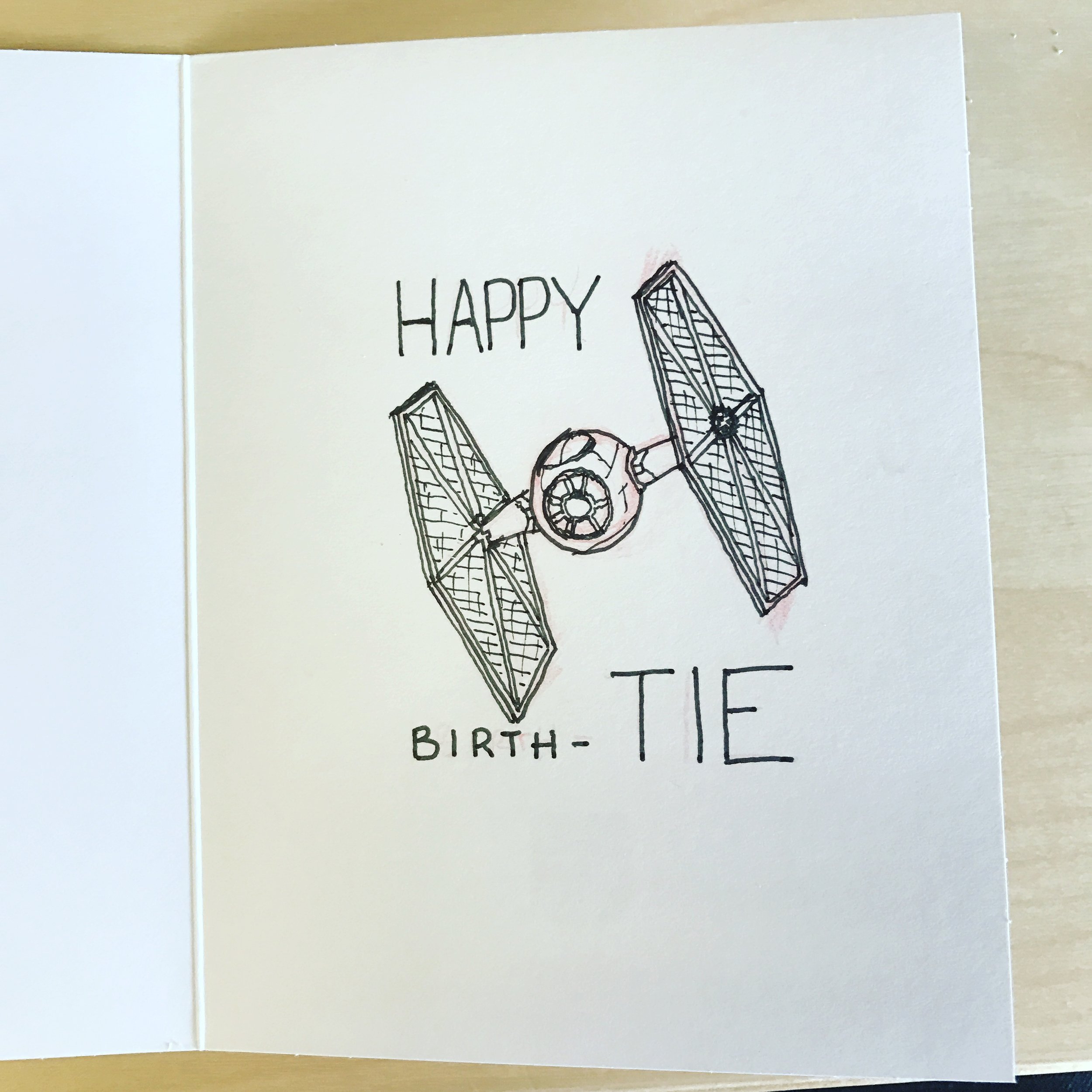 A Tie Fighter with the caption Happy Birth Tie