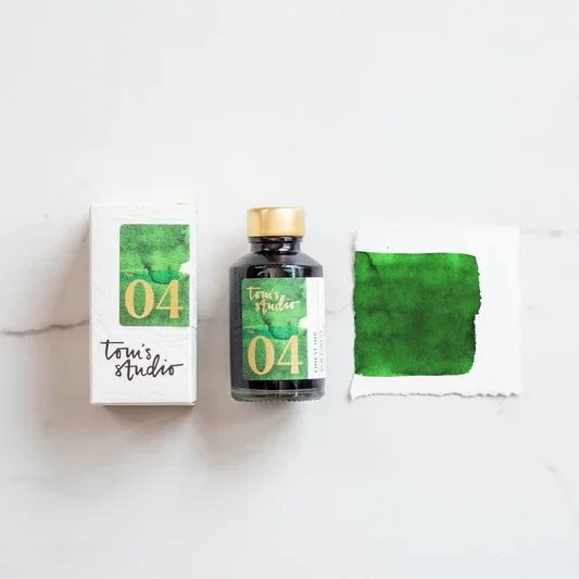 fountain-pen-ink-new-forest-green-packaging-bottle-swatch.webp