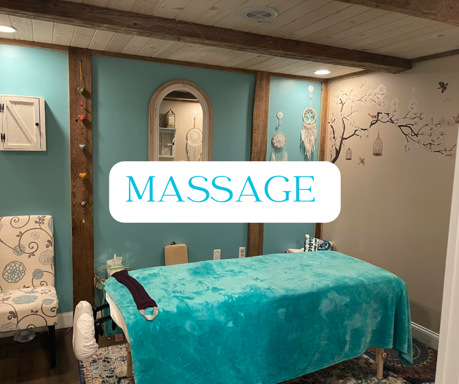 Massage therapy room with a teal massage table, decorative wall hangings, and soothing decor.