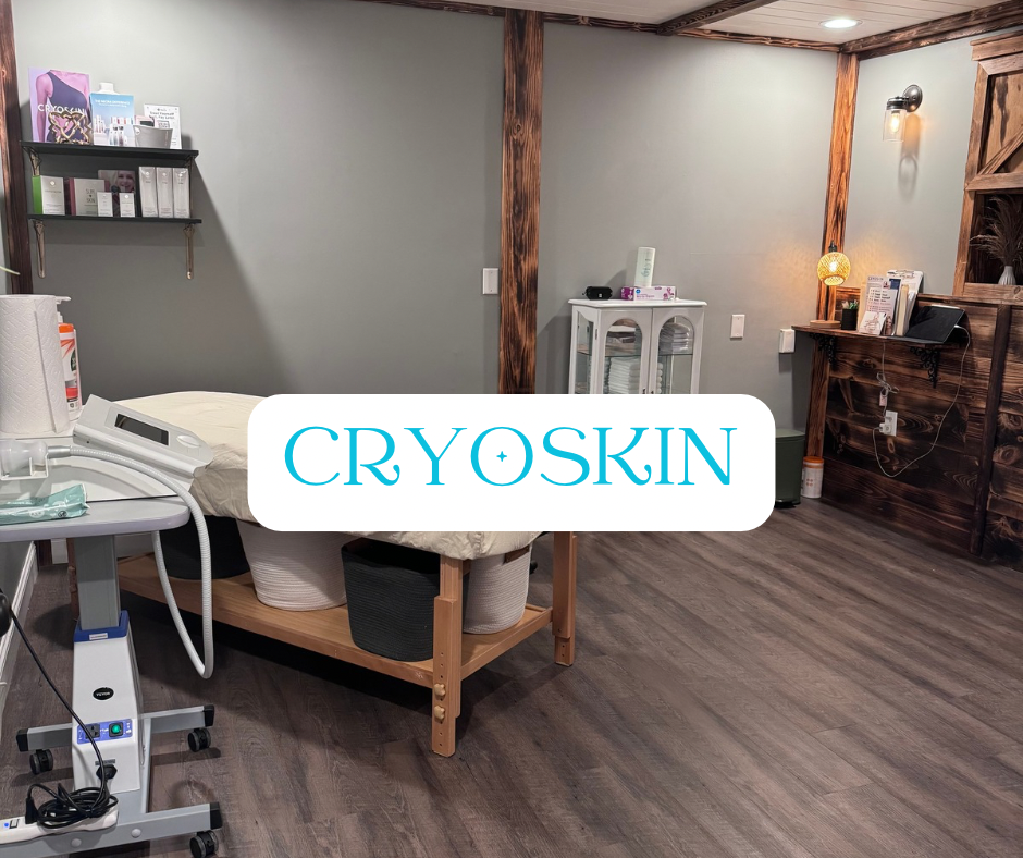 Cryotherapy treatment room with equipment, massage table, and shelving.
