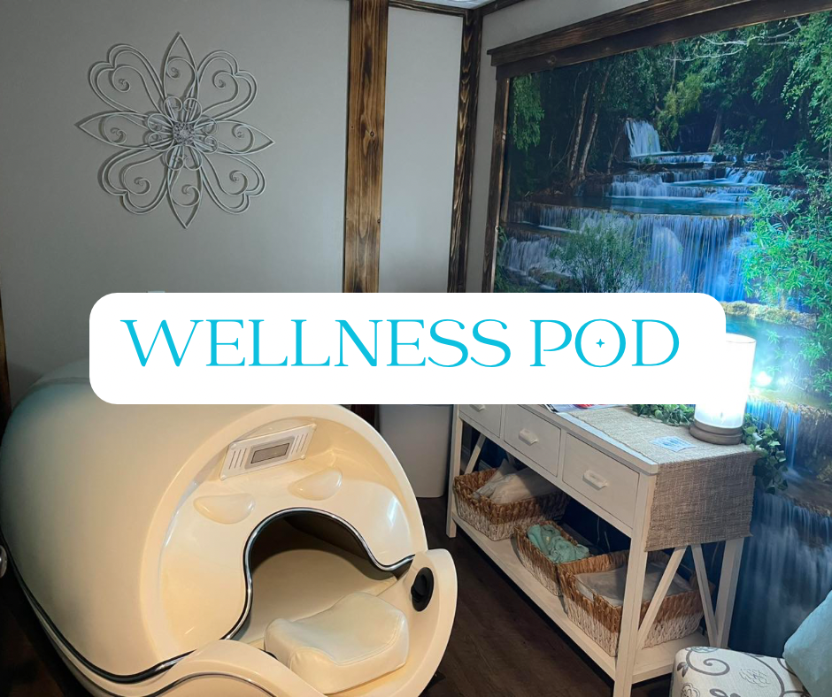 A wellness pod in a relaxation room with a serene waterfall mural and decorative wall art.
