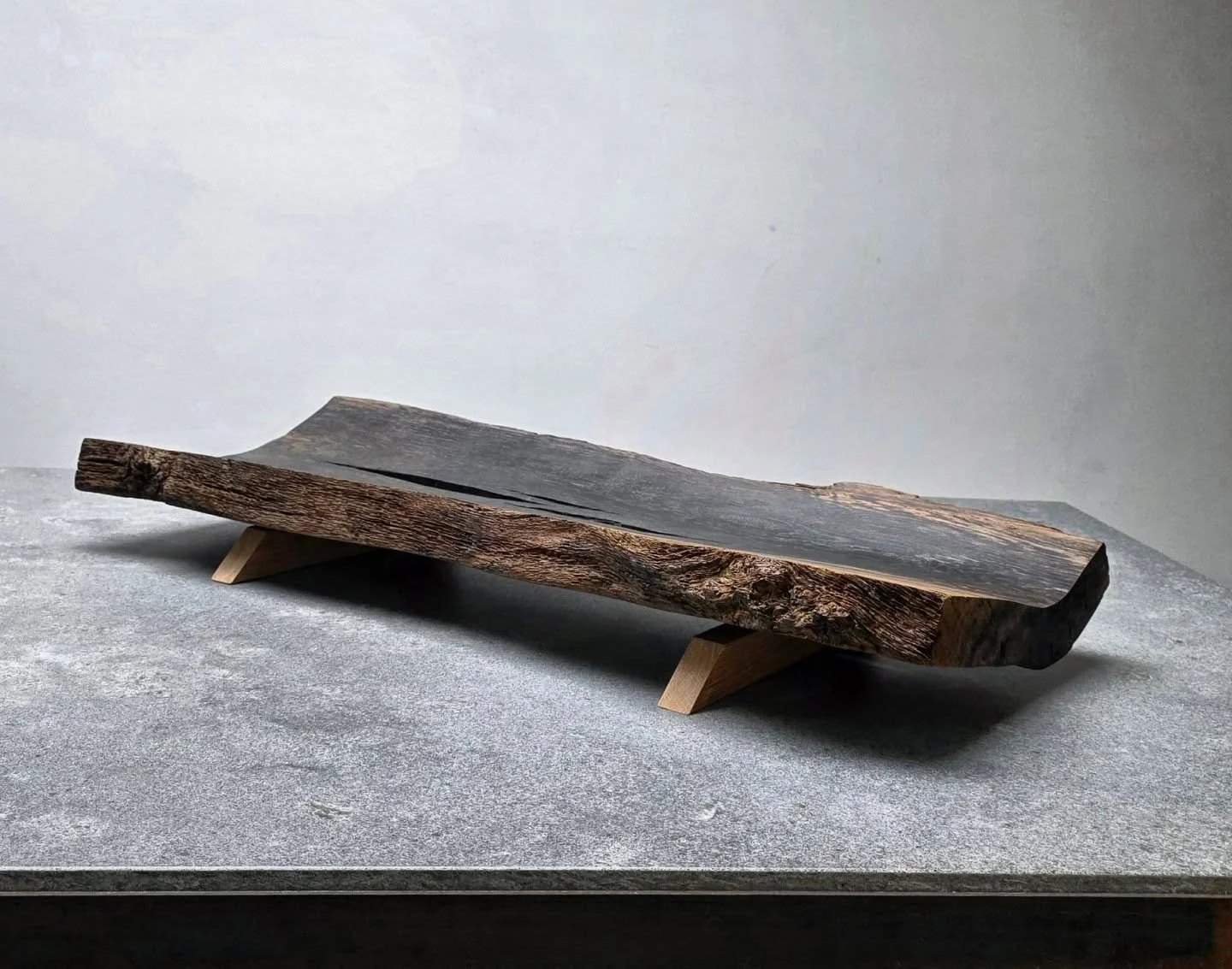 Bog Oak Platter

A piece of history, reimagined.

This bespoke platter is crafted from ancient bog oak&mdash;wood that has rested beneath the earth for thousands of years, slowly darkening and strengthening over time. Each grain tells a story, each m