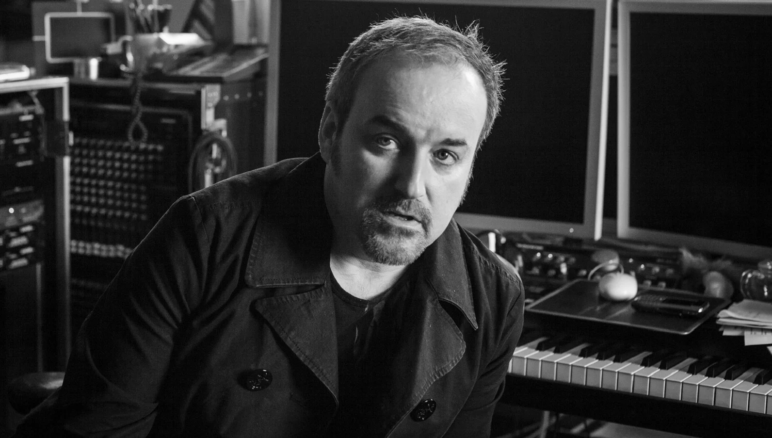 Composer David Arnold in his studio