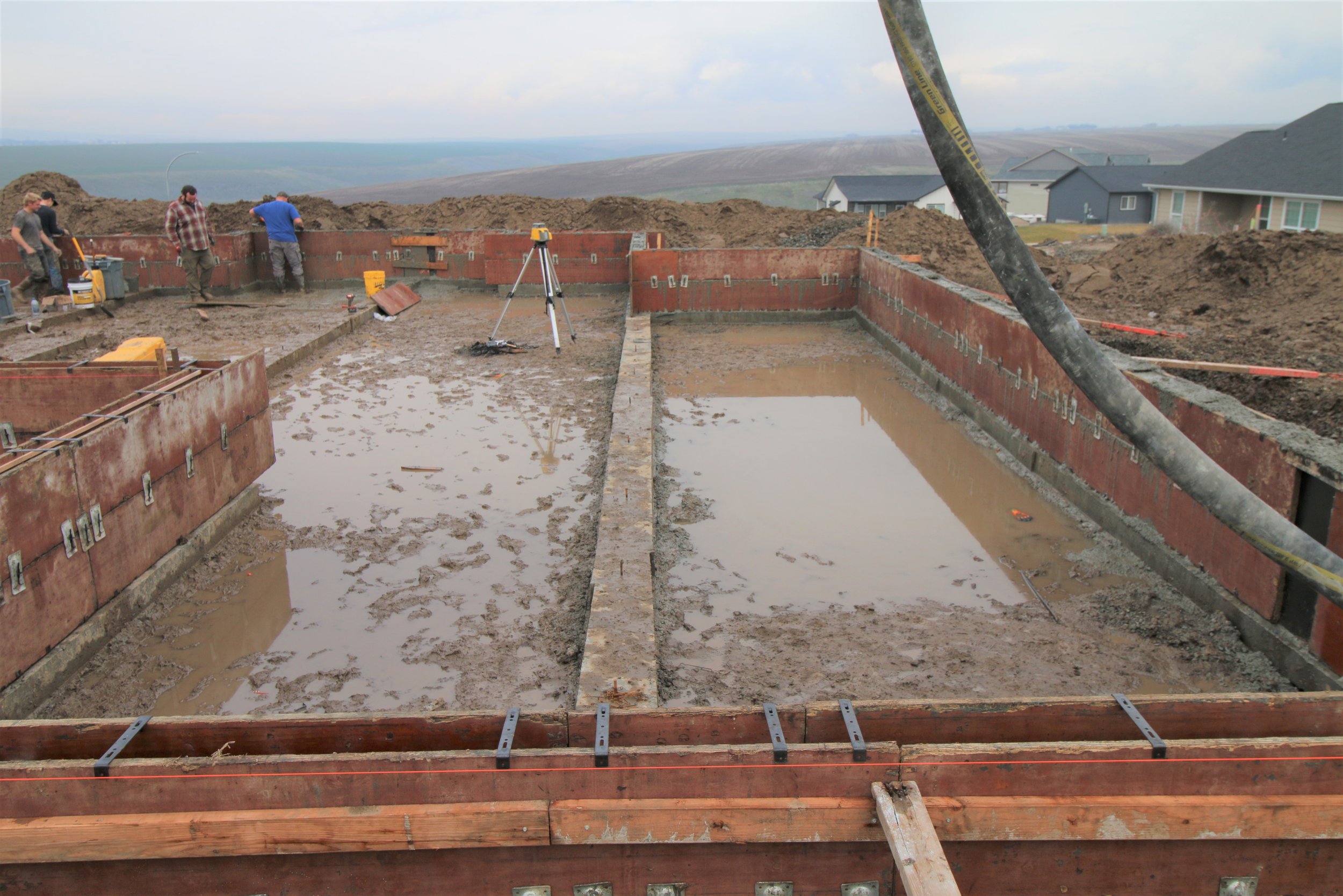 Pouring The Foundation — JL Construction - Apartment Renovation Poured Foundation
