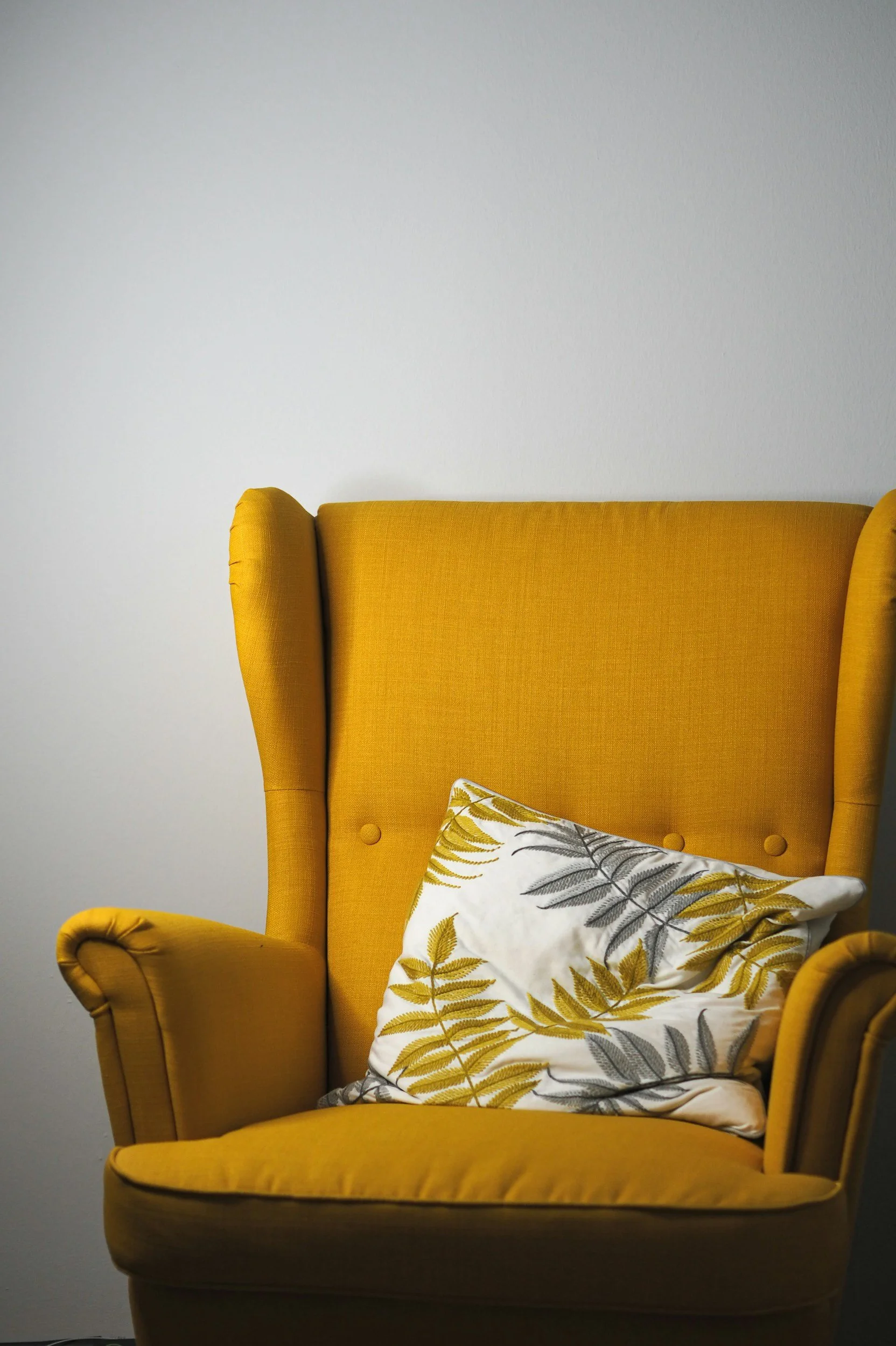 Armchair in trauma-informed counselling room.