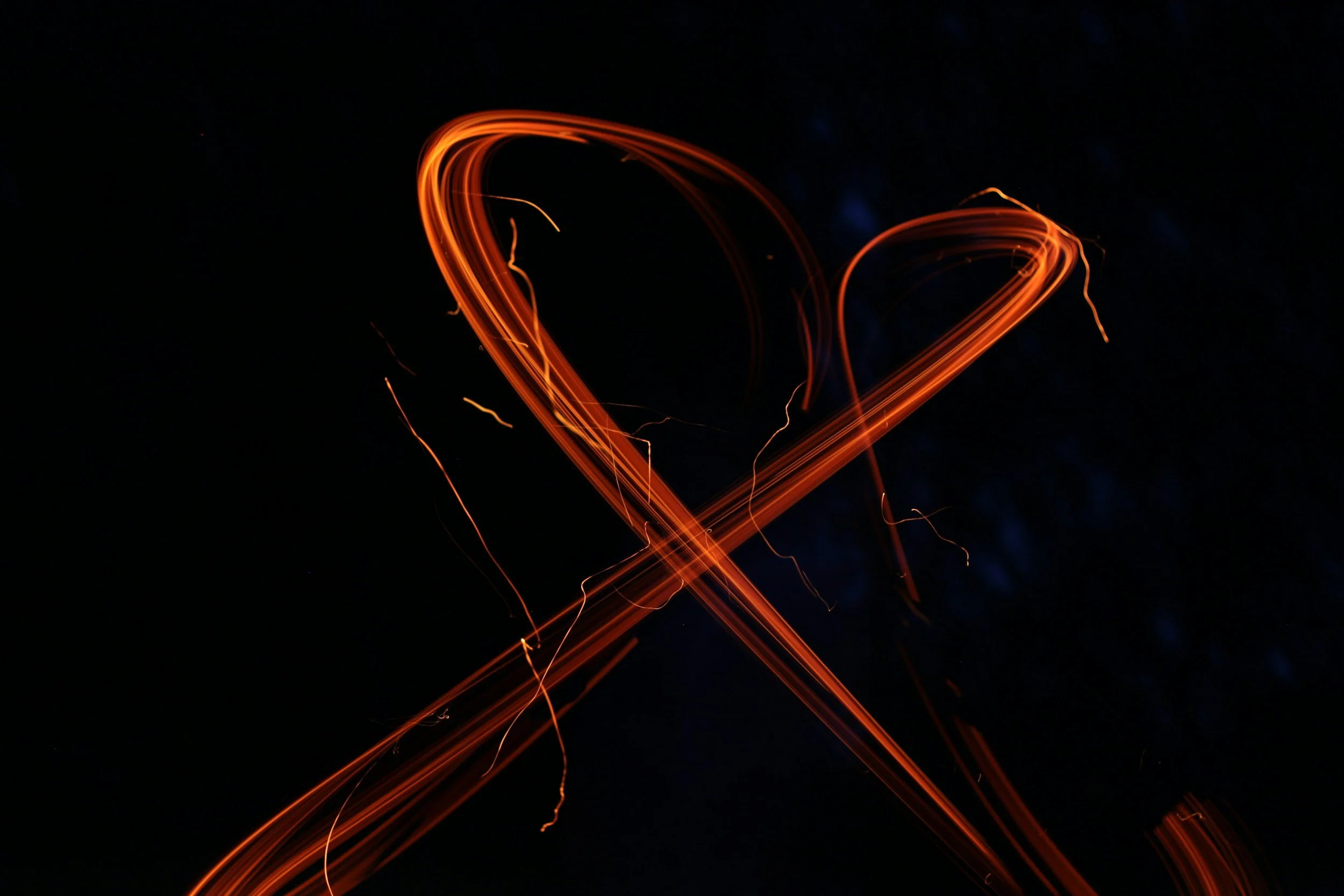 Abstract light forming a heart shape, representing intense but unstable attraction