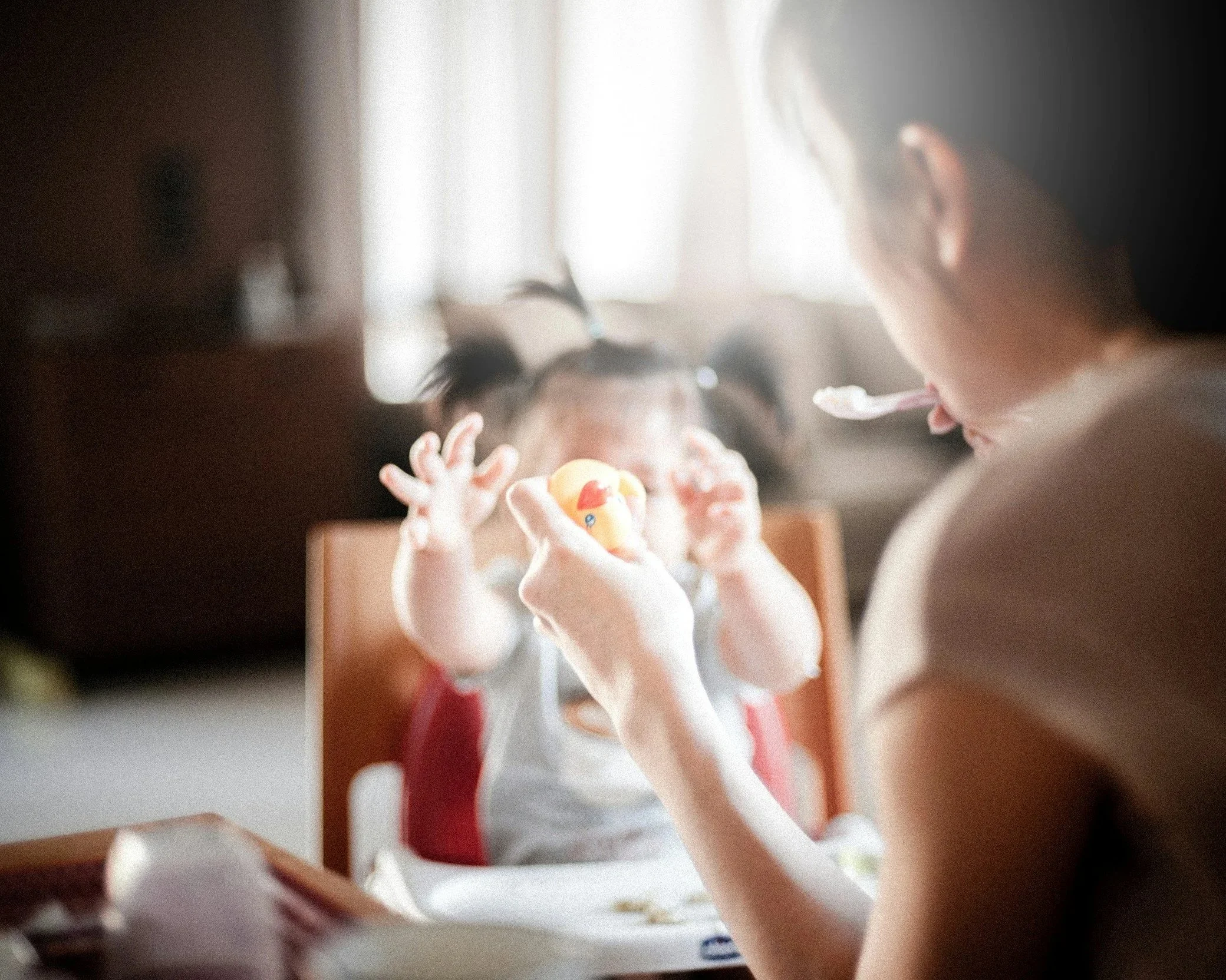 parent and child interacting in a way that suggests role reversal and emotional responsibility placed on the child