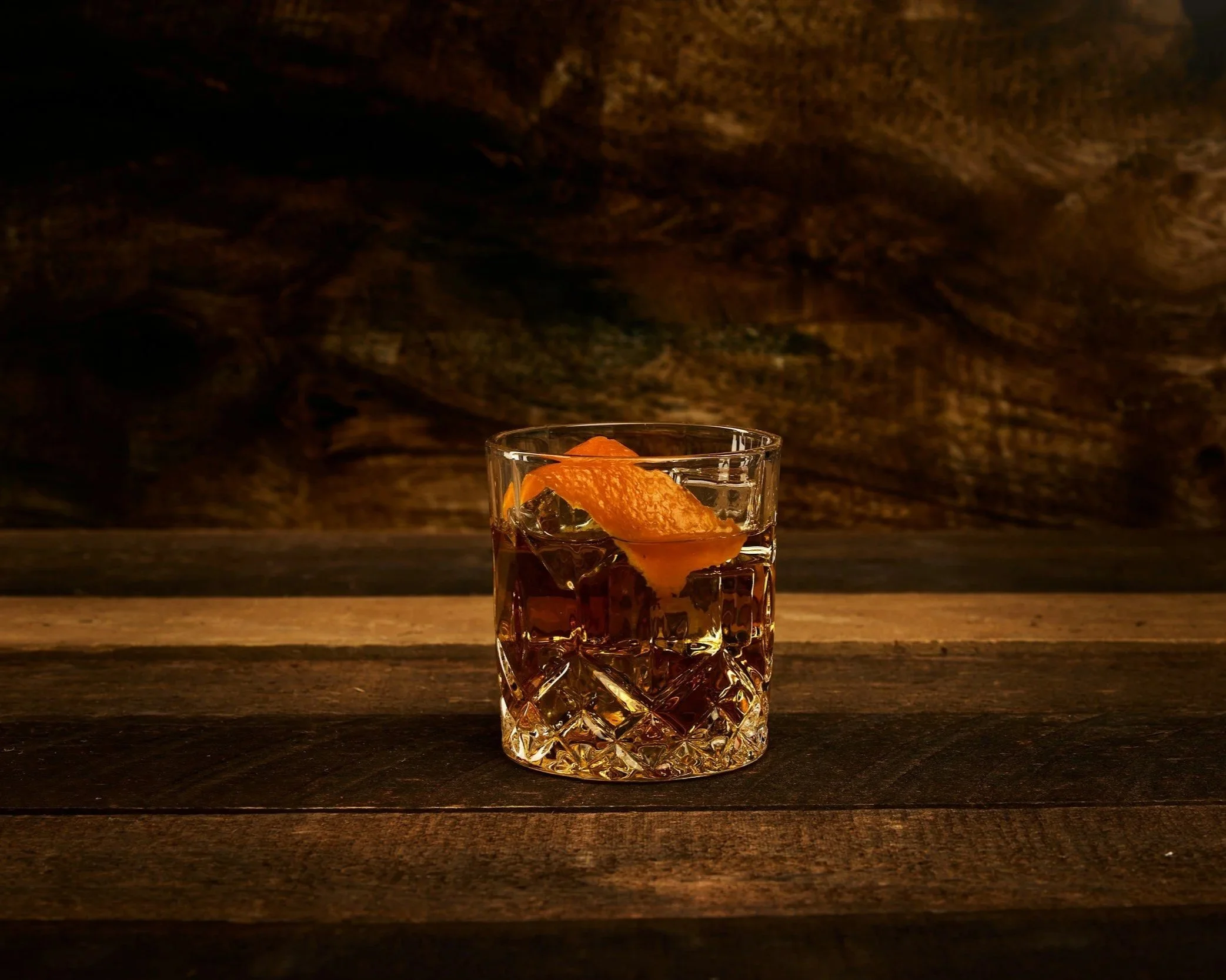 glass of alcohol on table representing impact of growing up in an alcoholic household