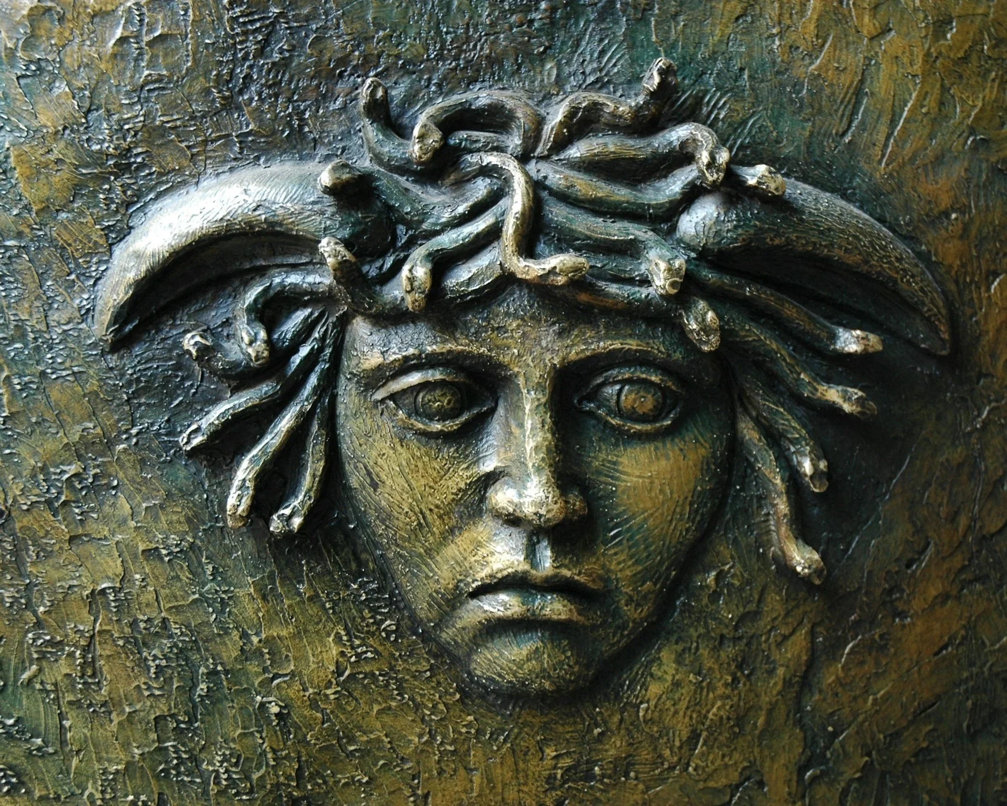 Sculpture of a face representing different shame responses and protective patterns