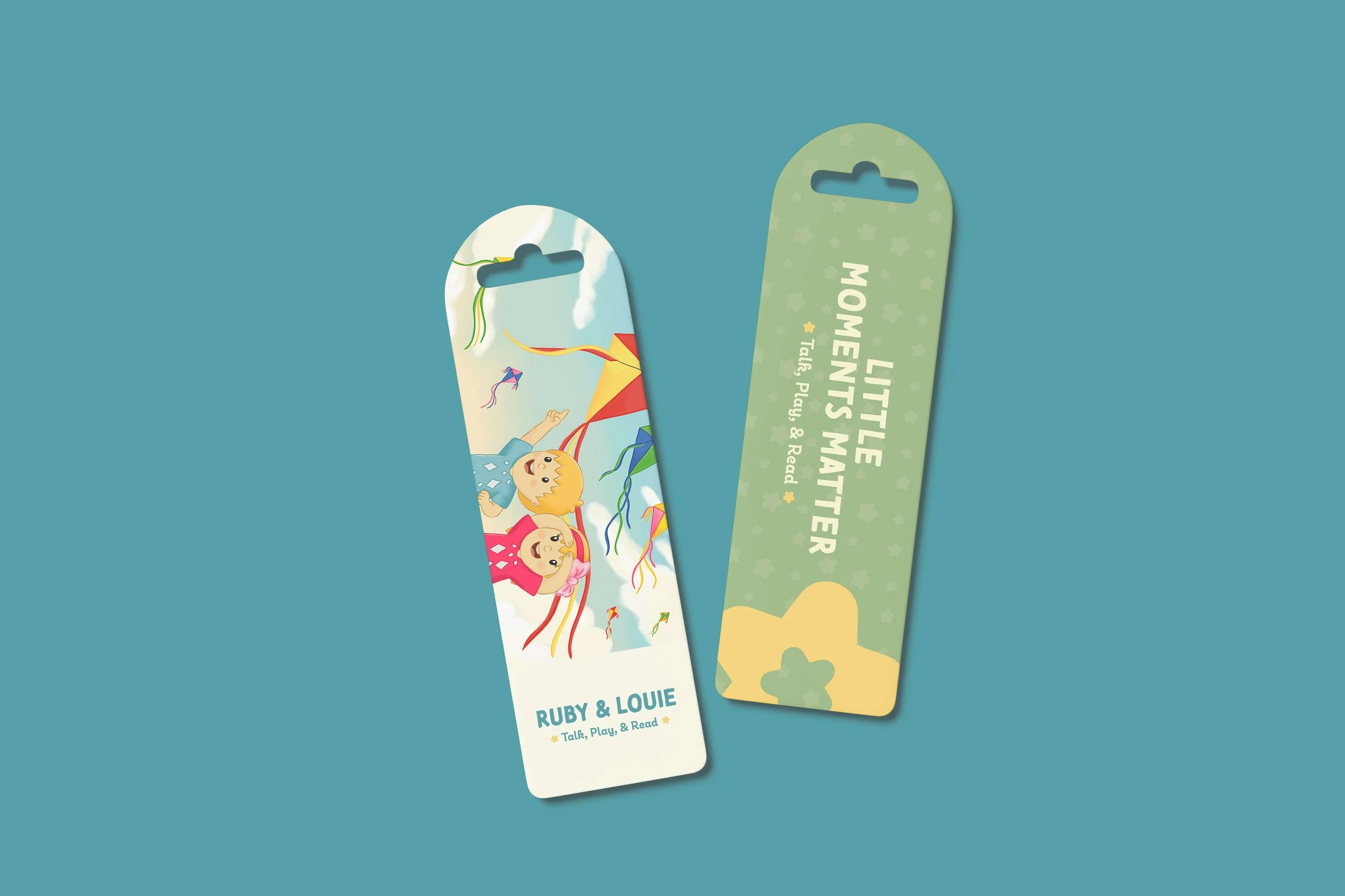 Talk, Play, & Read branded bookmark mockup featuring Ruby and Louie illustrations and the Little Moments Matter tagline.