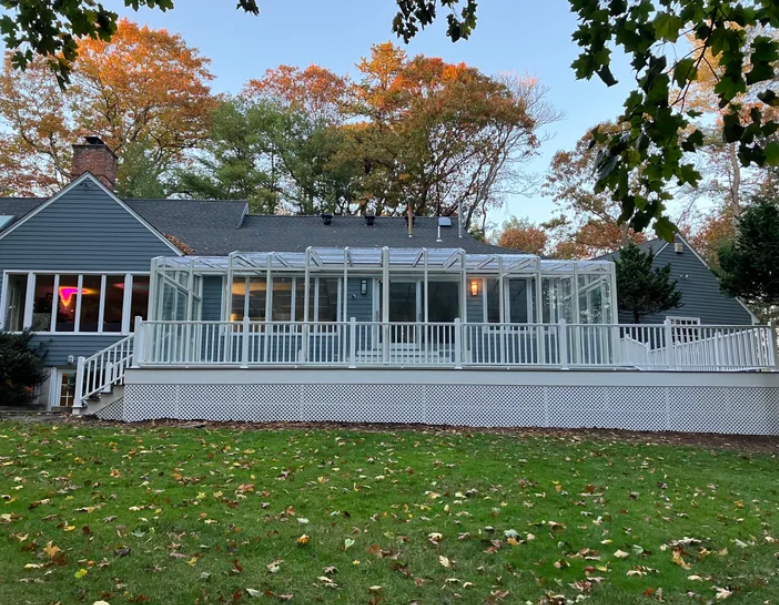 Custom sunroom and deck addition in Hingham, MA by MSDG Construction