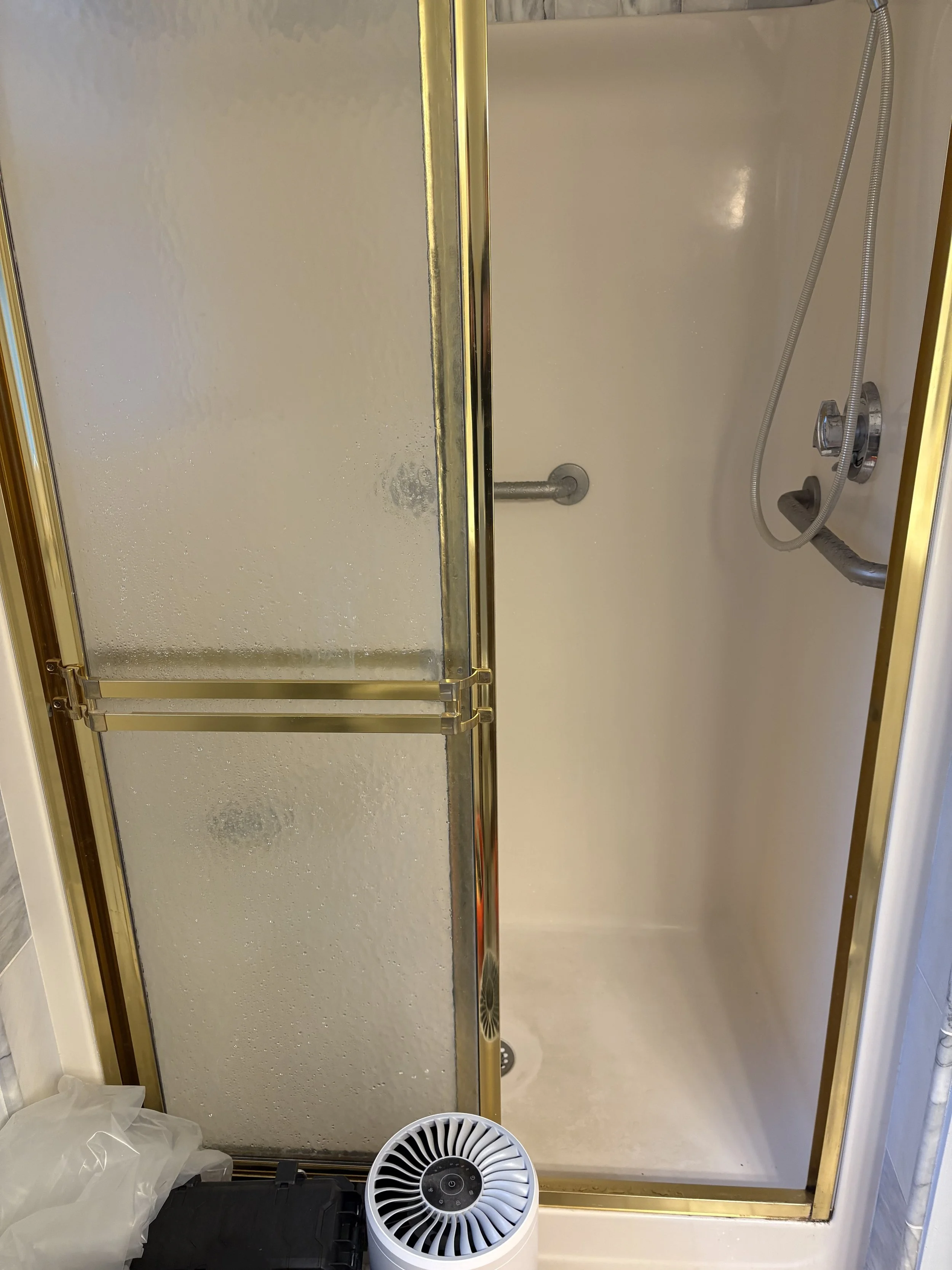 Bathroom remodel Kingston MA before photo old brass shower door
