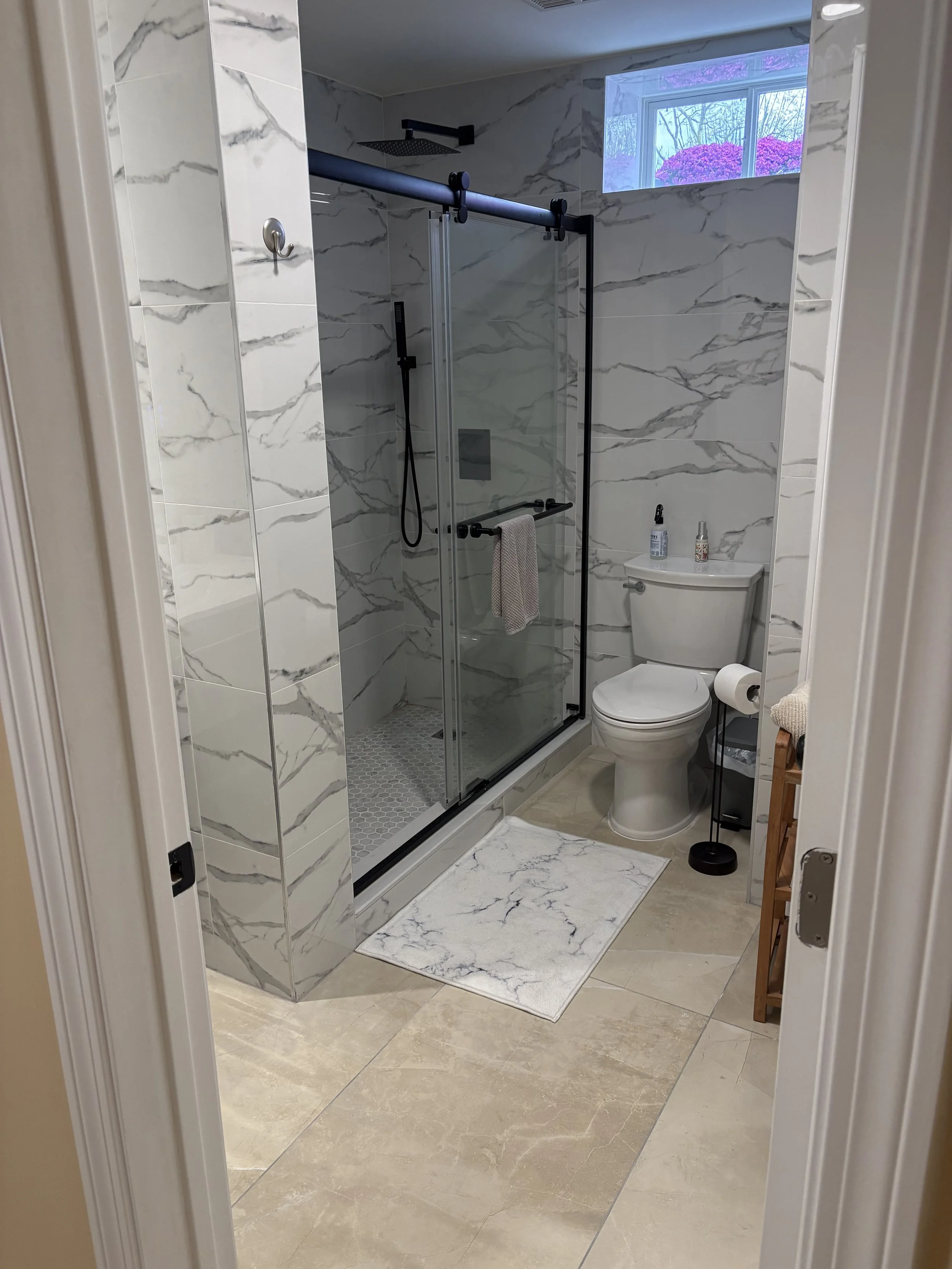 Finished basement bathroom with tiled walk-in shower — Plymouth, MA basement finishing by MSDG Construction