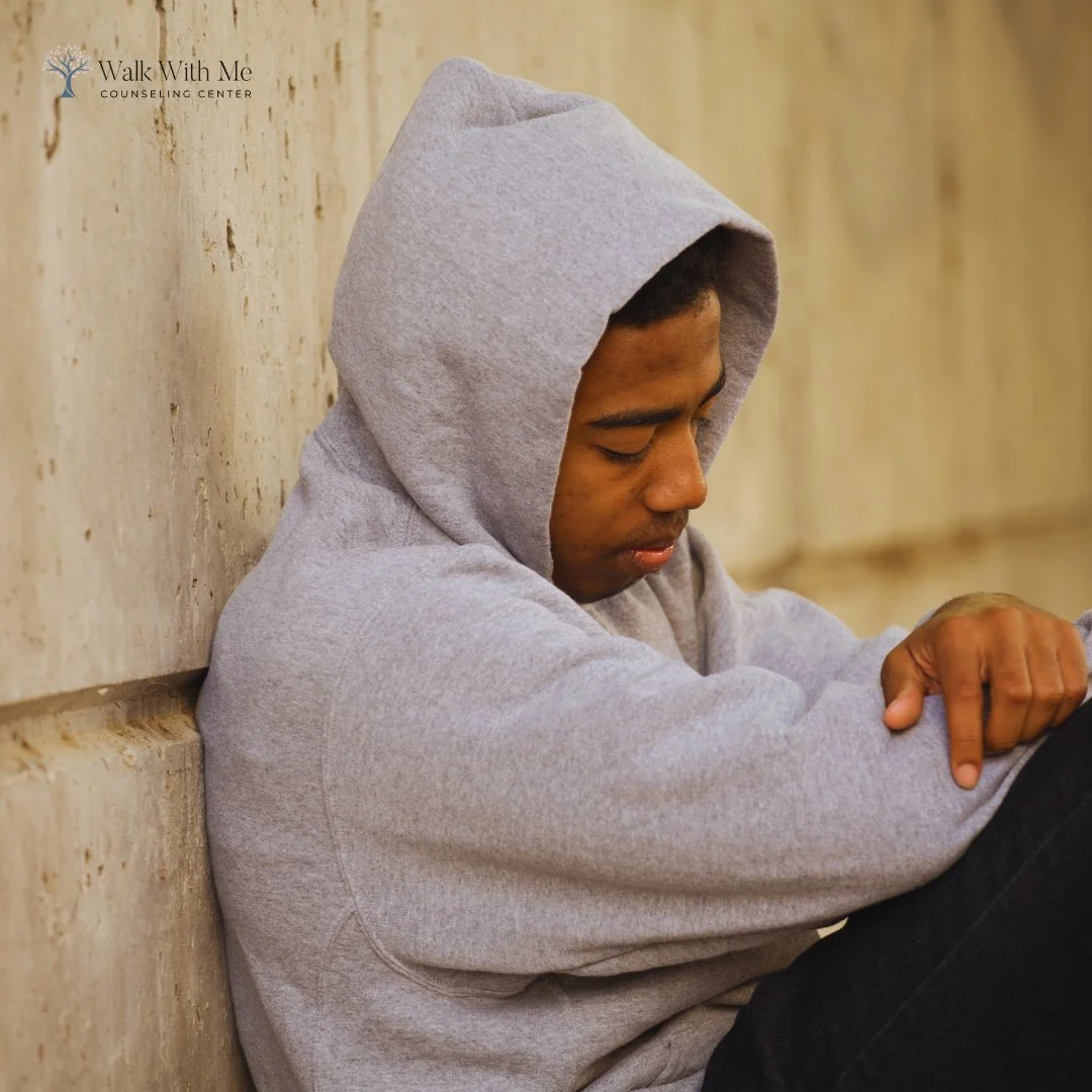 A young man alone and lonely