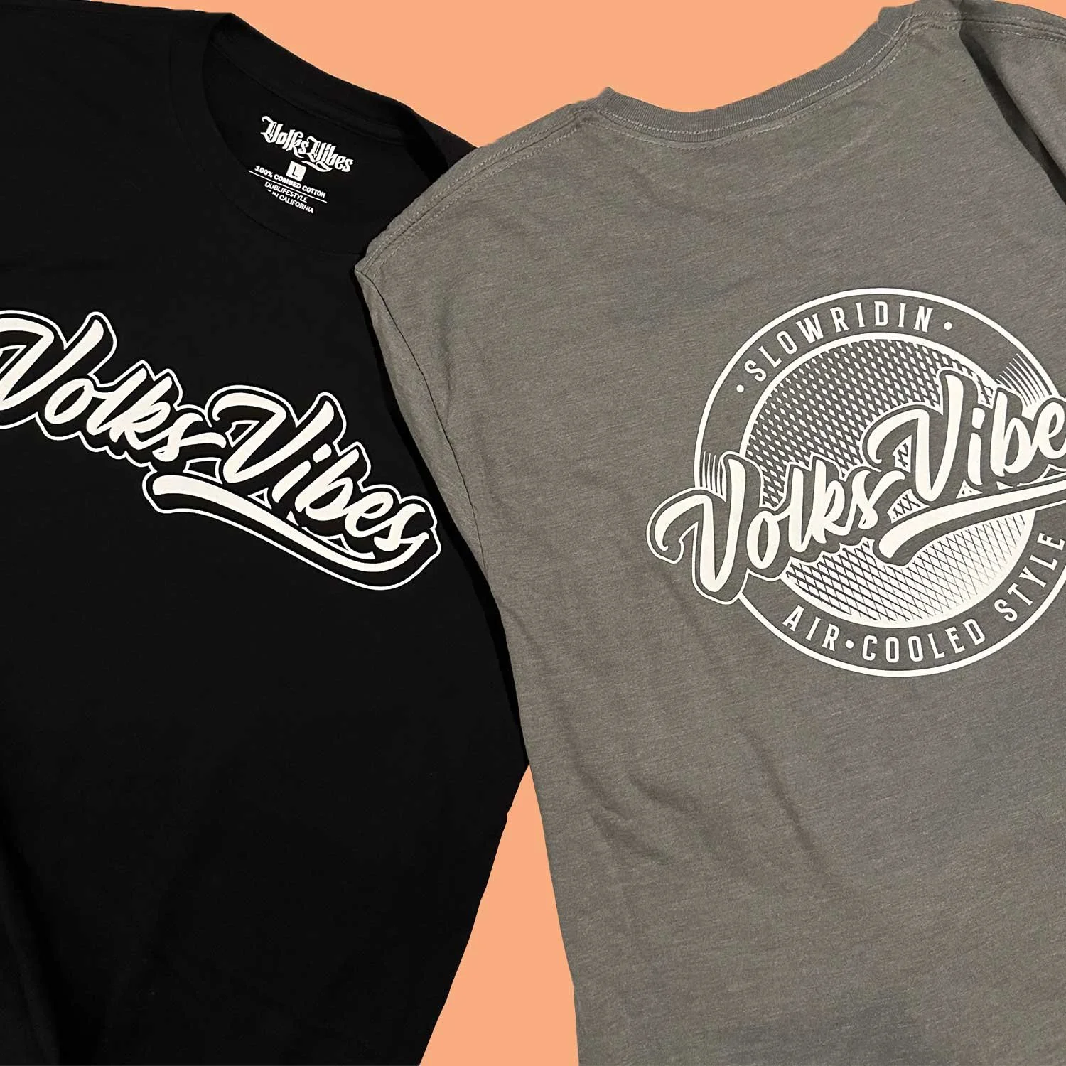 Two T-shirts, one black and one gray, with the text 'Vokes Vibes' printed on the front. The gray shirt has additional circular design elements and text, including 'Slow Ridin,' 'Air-Cooled Style,' and 'XXX'.