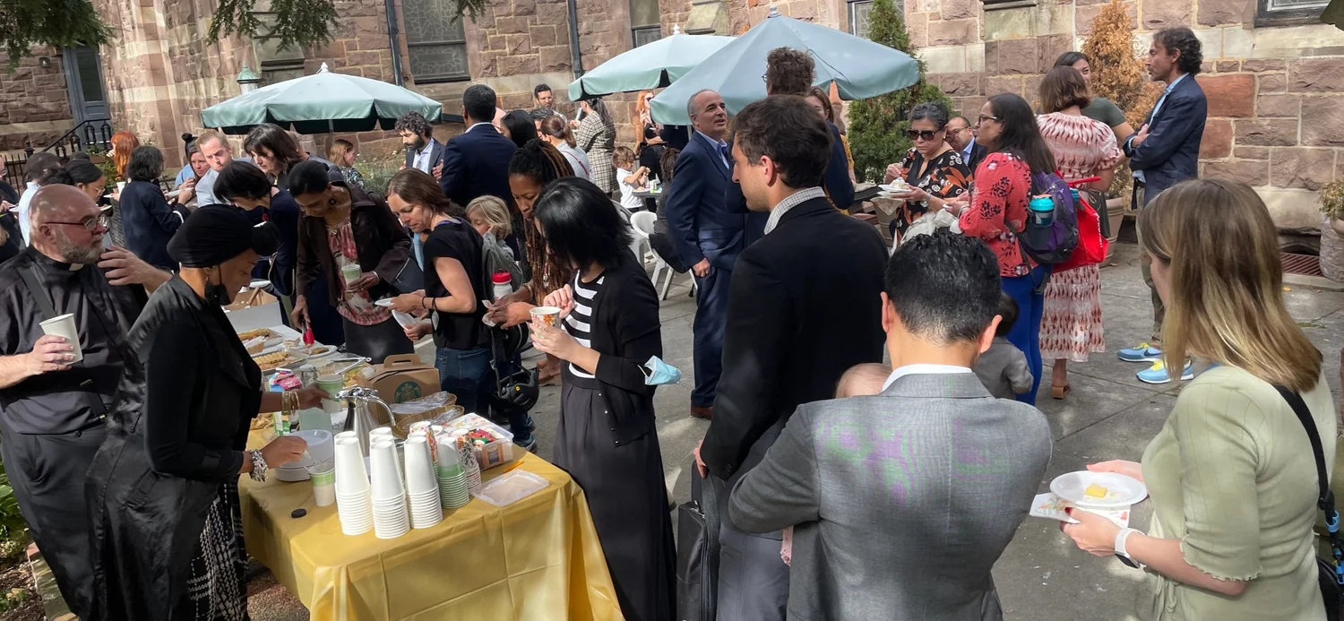 Guests gathered in the church courtyard