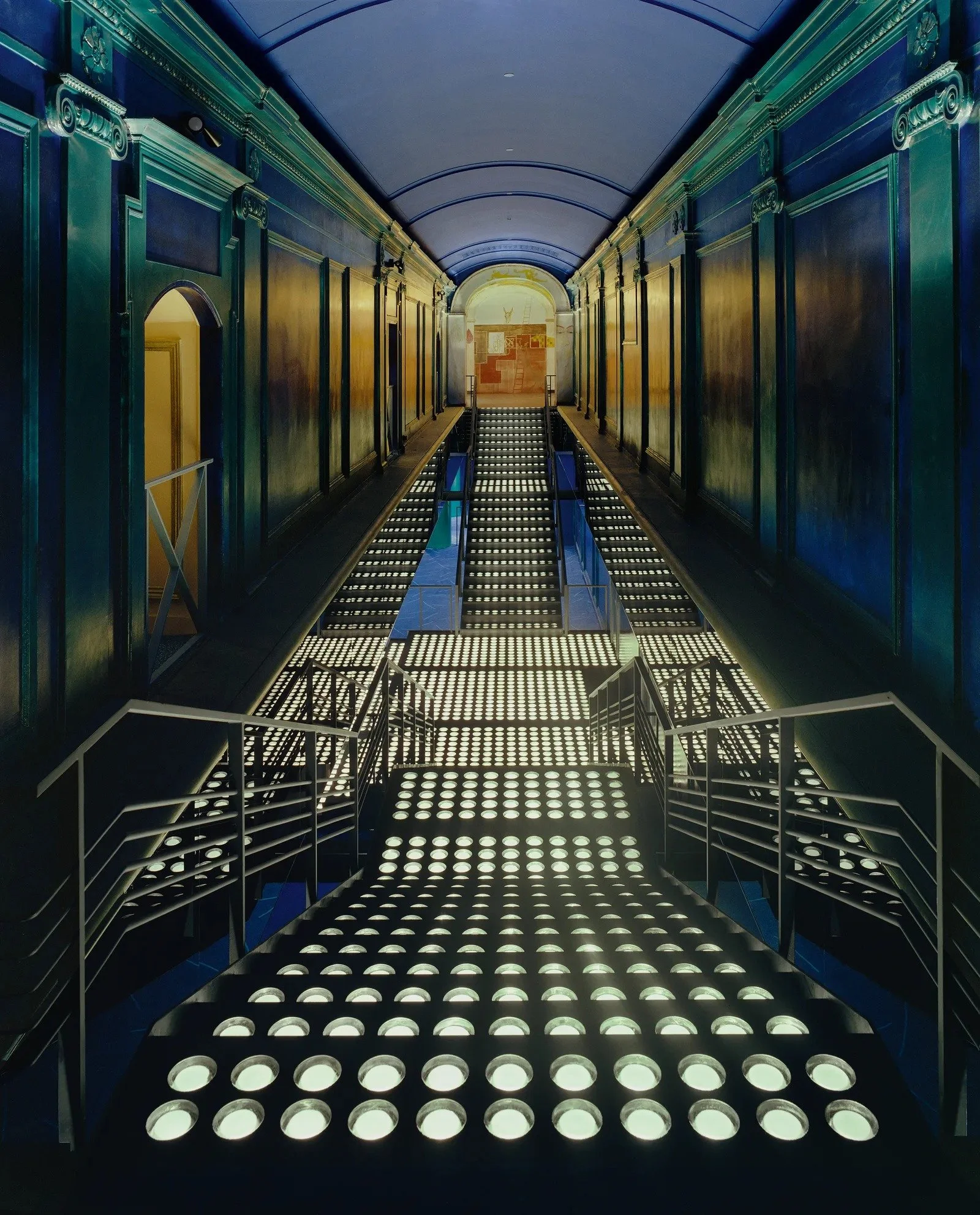 Wide enough to accommodate hordes of people at any one time, the Palladium’s illuminated stairs were a foretaste of the glamour that awaited them on all seven storeys of the East 14th Street club.