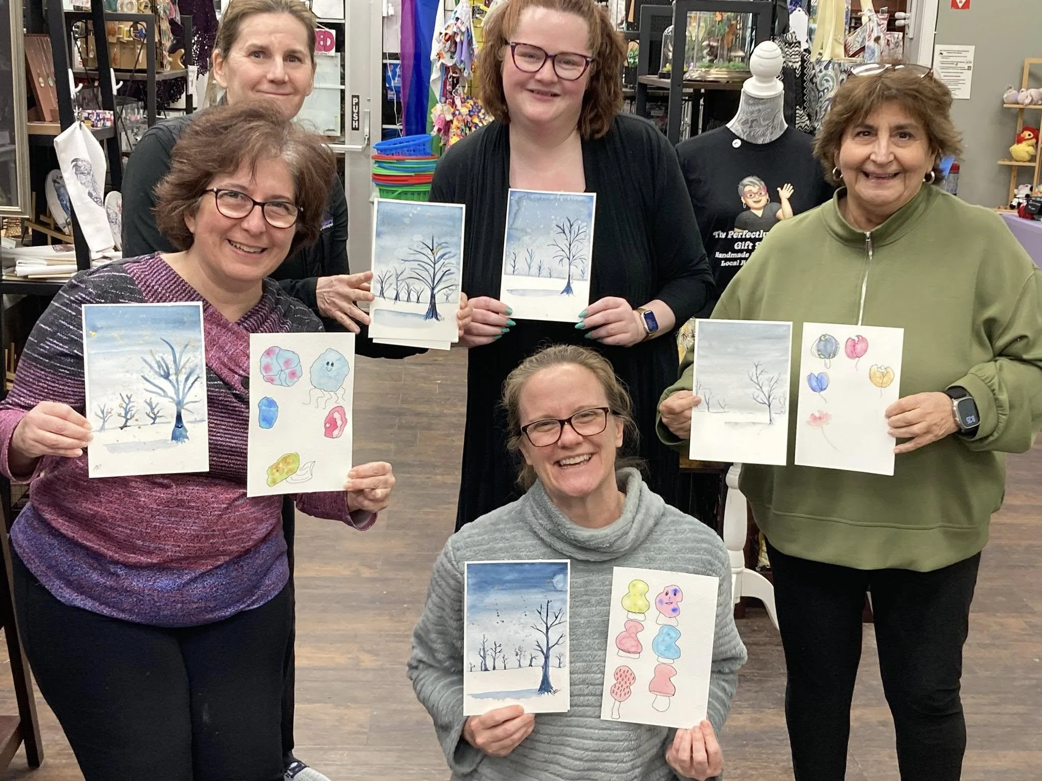 creative workshop group painting session with whimsical designs
