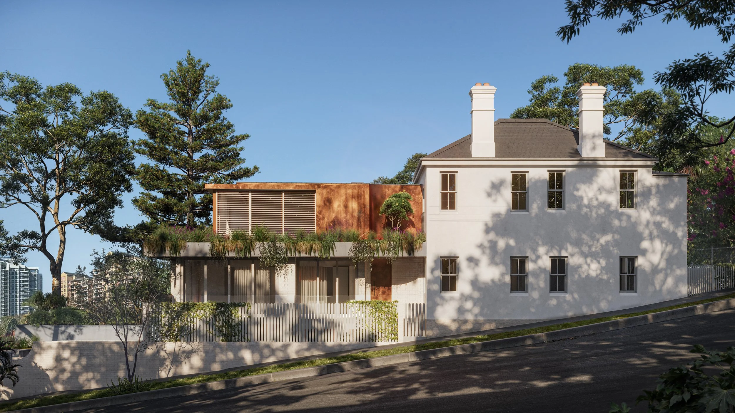 Modern house with white exterior, flat roof extension with wooden panels, and lush greenery including trees and plants on a sunny day.