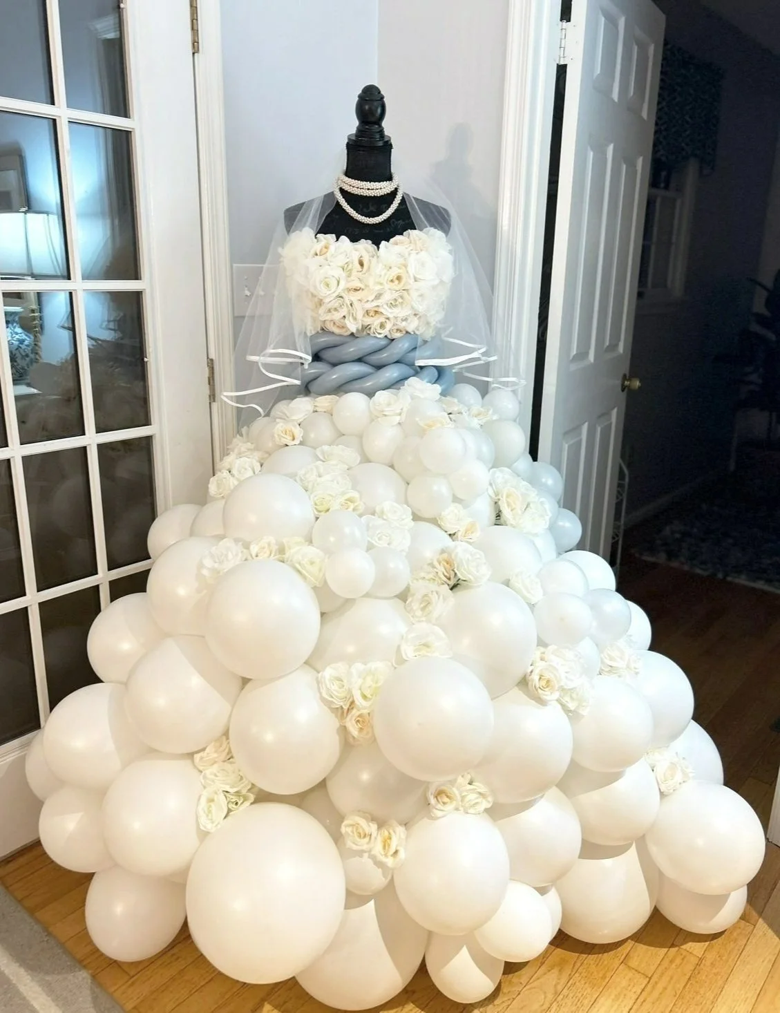 Bride made out of silk flowers and balloons for a bridal shower