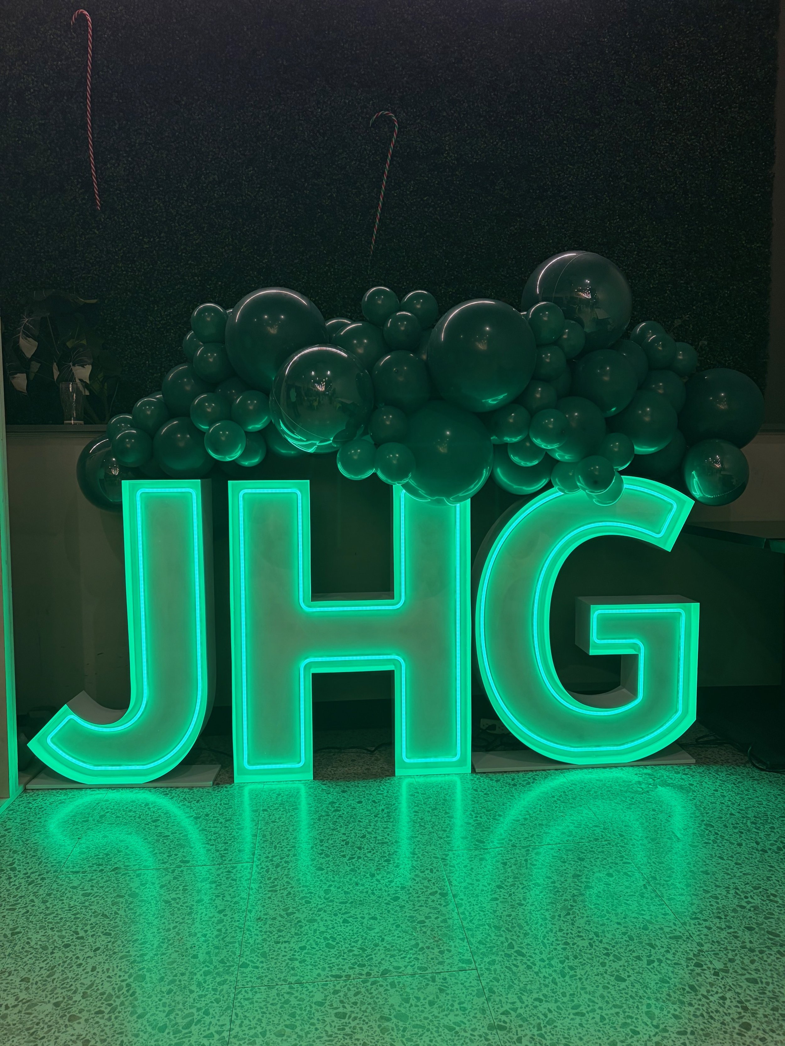 Marquee letters spelling 'JHG'