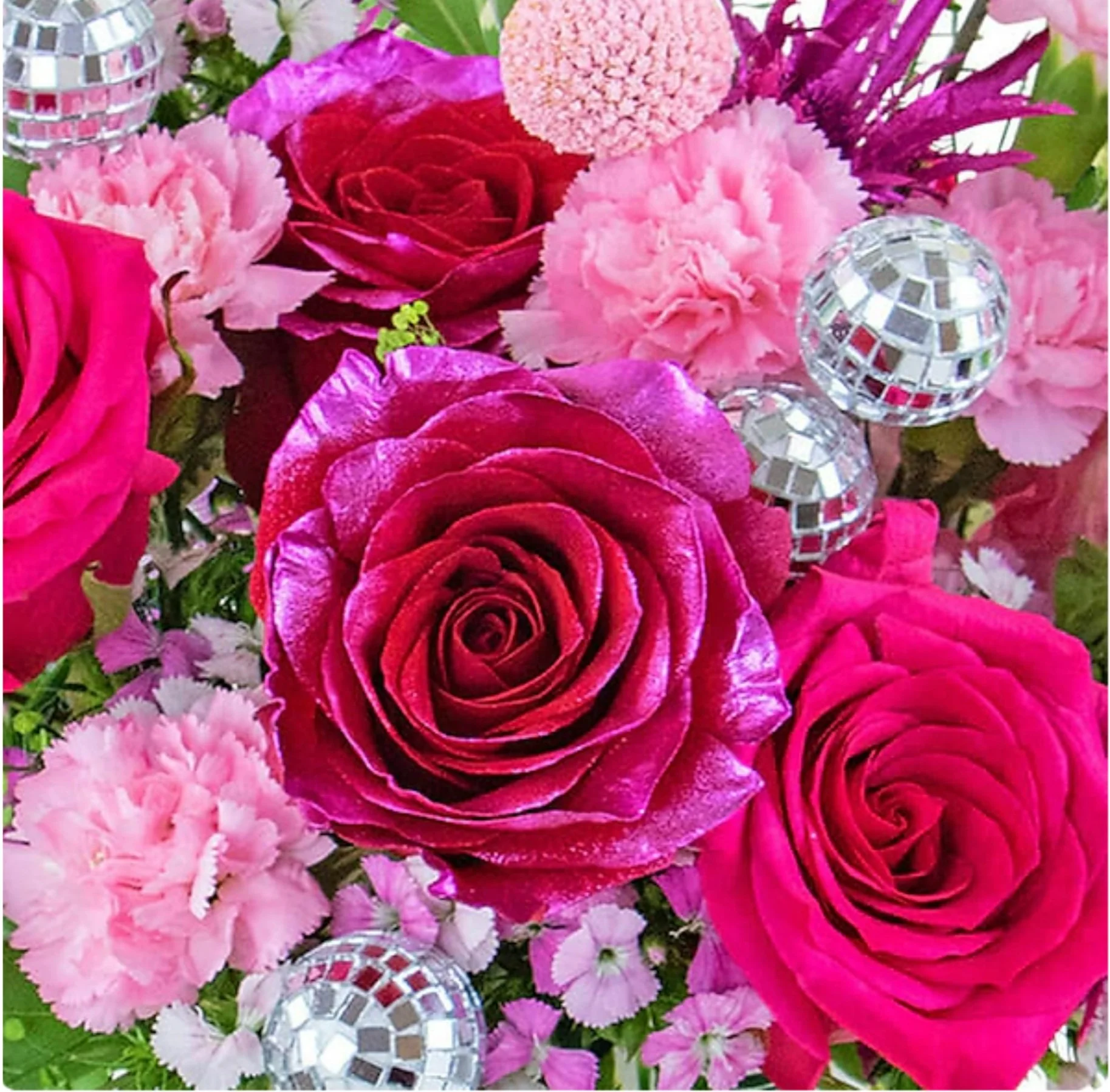 Picture of different color roses and disco balls