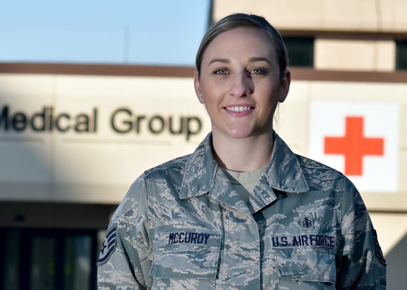 pivotal pelvis founder cassidy mccurdy standing in her US air force medic uniform