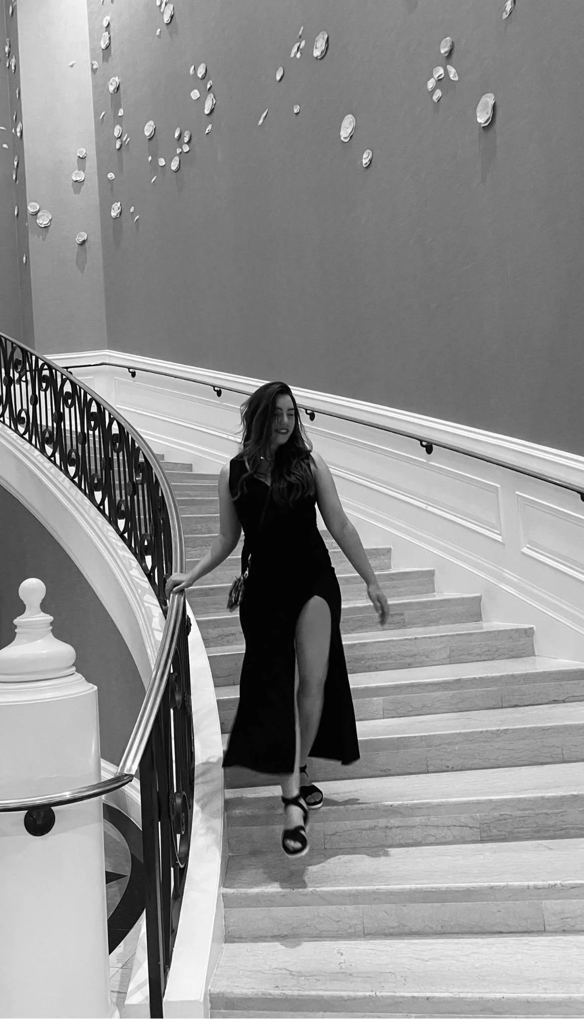 Event violinist Abigail Shelton in a formal dress preparing to perform at an upscale party in Los Angeles