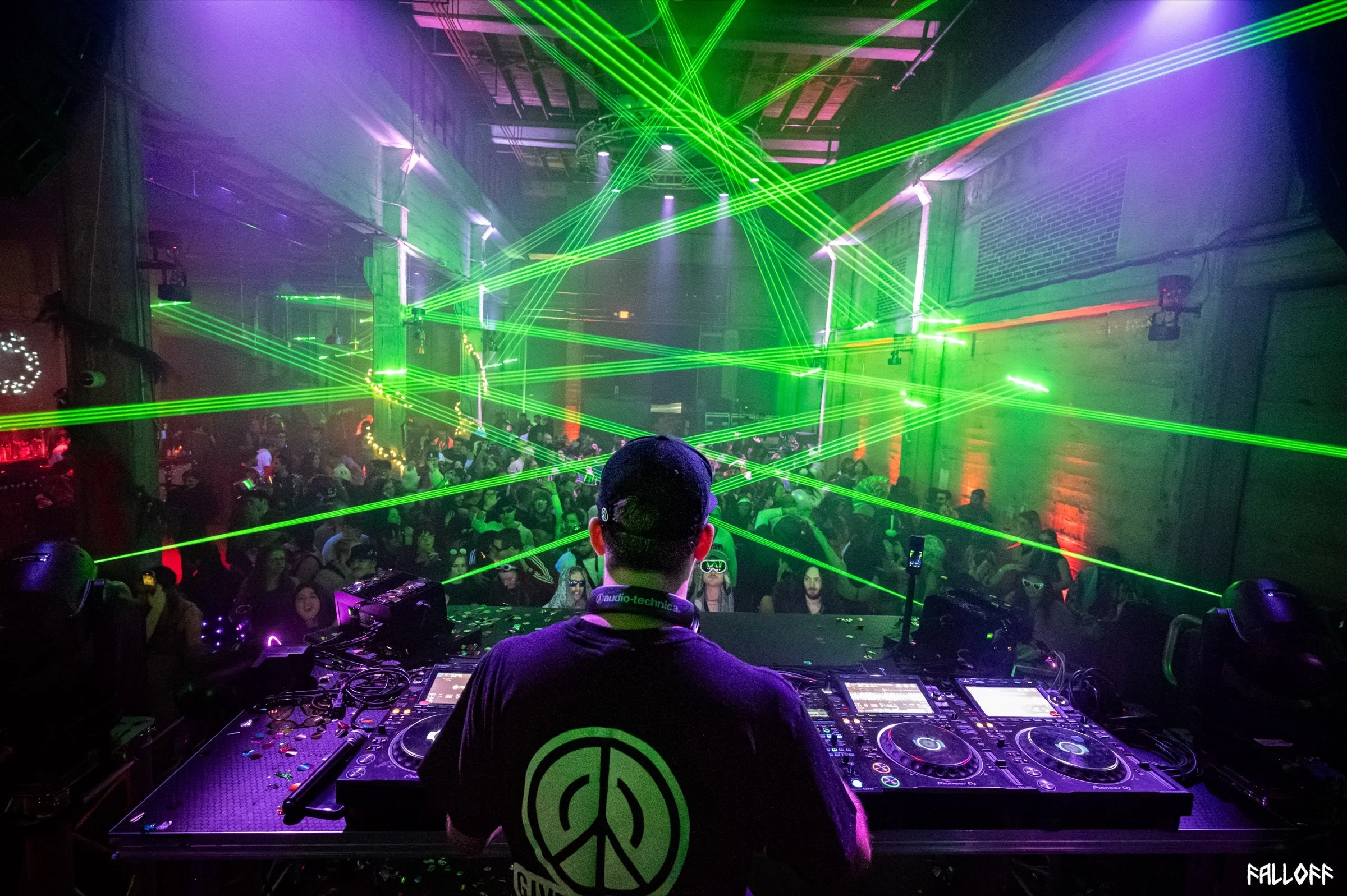 Given Peace performing with green lasers above the crowd — photo by Falloff Pix Media