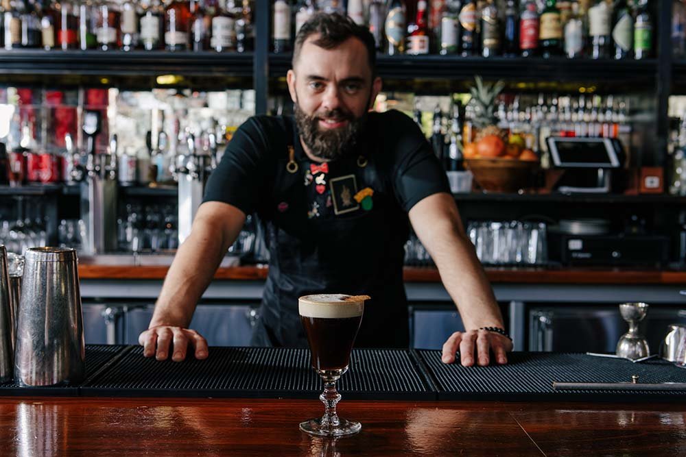 bartender presenting cocktail