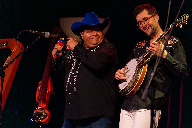 Celebrating Global Music, Building Cultural Connection 🌍🎶
Day 8: Larry &amp; Joe 🇻🇪🇺🇸

Larry &amp; Joe are a dynamic duo blending the traditional sounds of the Venezuelan plains and the American South. With Larry on the banjo and Joe on the har