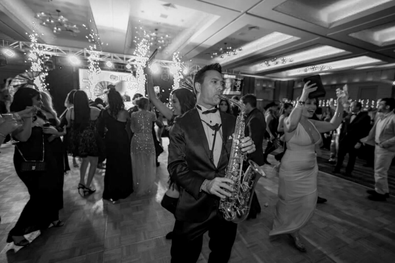 The LoveTap DJ and live saxophone wedding performance